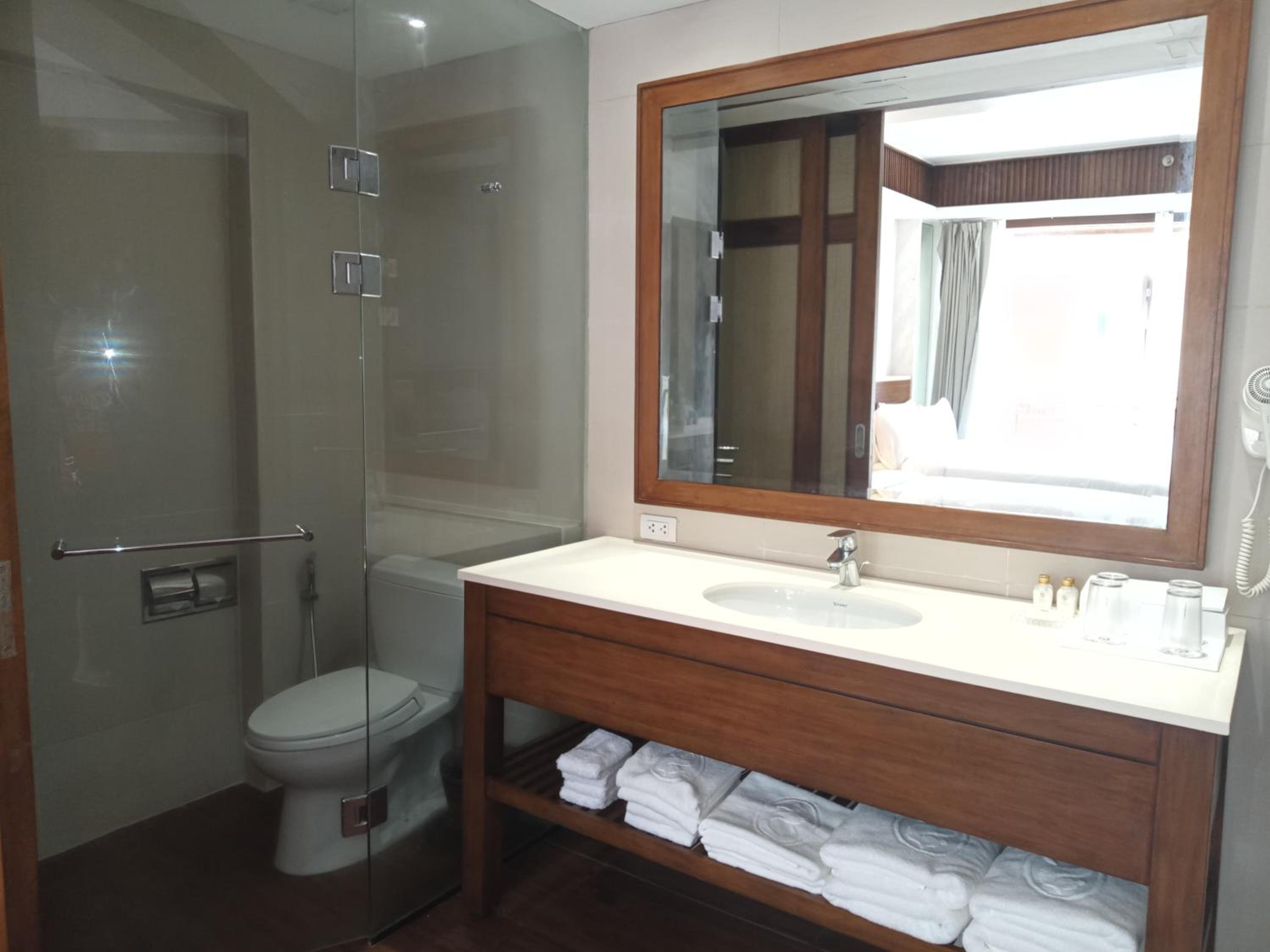 Deluxe Quadruple Room - Photo 10