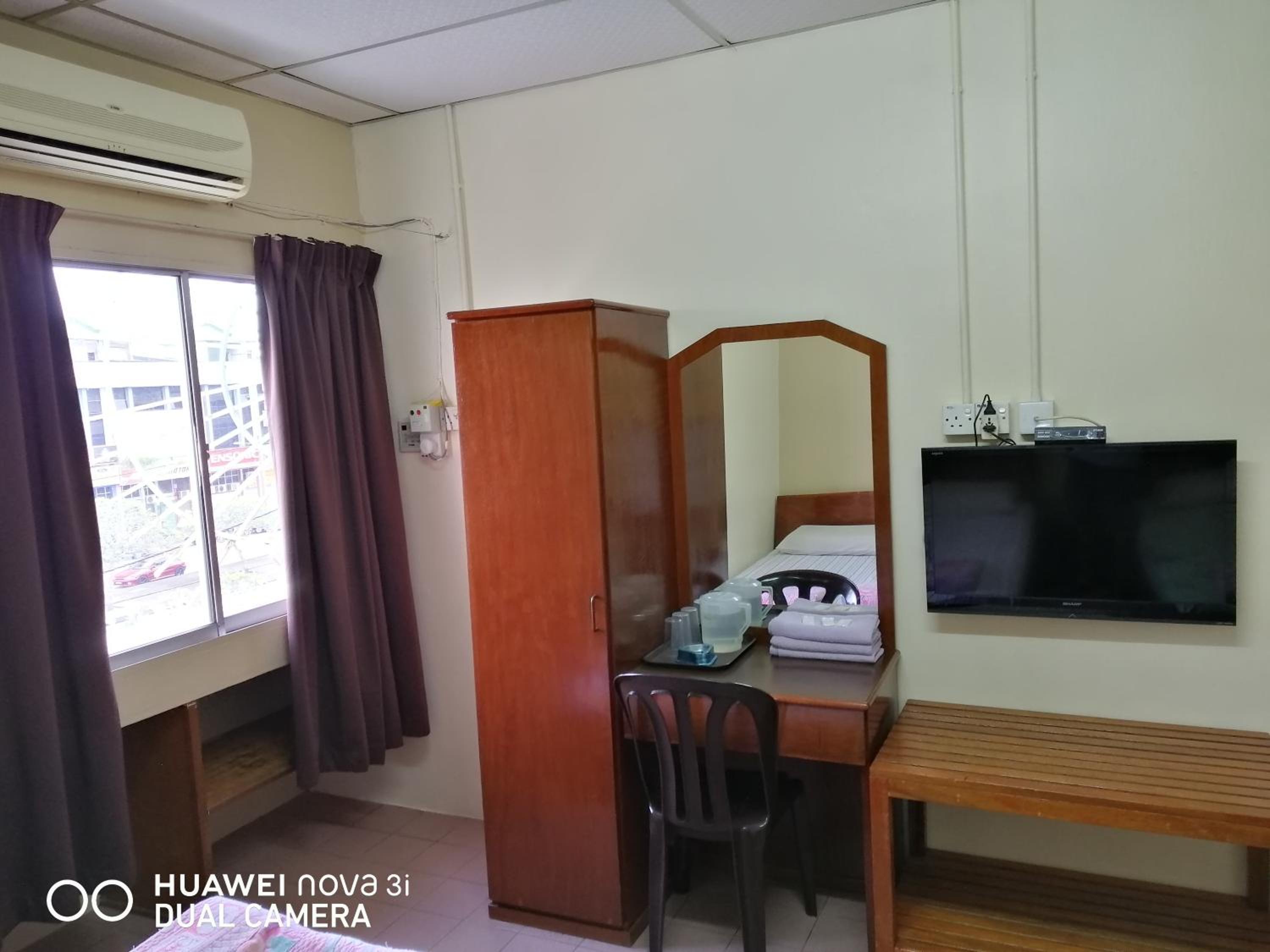 Economy Triple Room - Photo 2