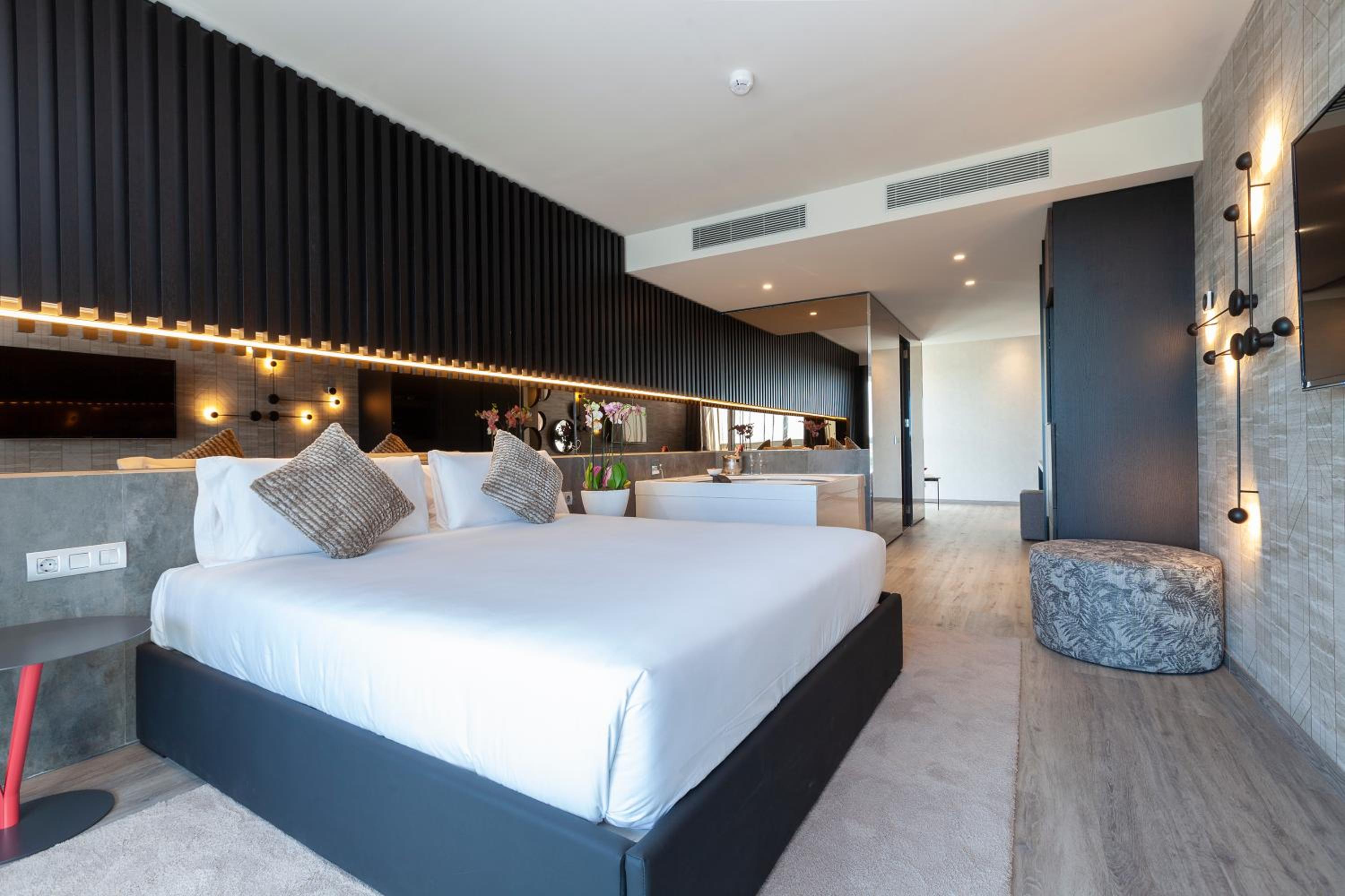 Suite Deluxe con Bañera de Hidromasaje Suite Deluxe con Bañera de Hidromasaje