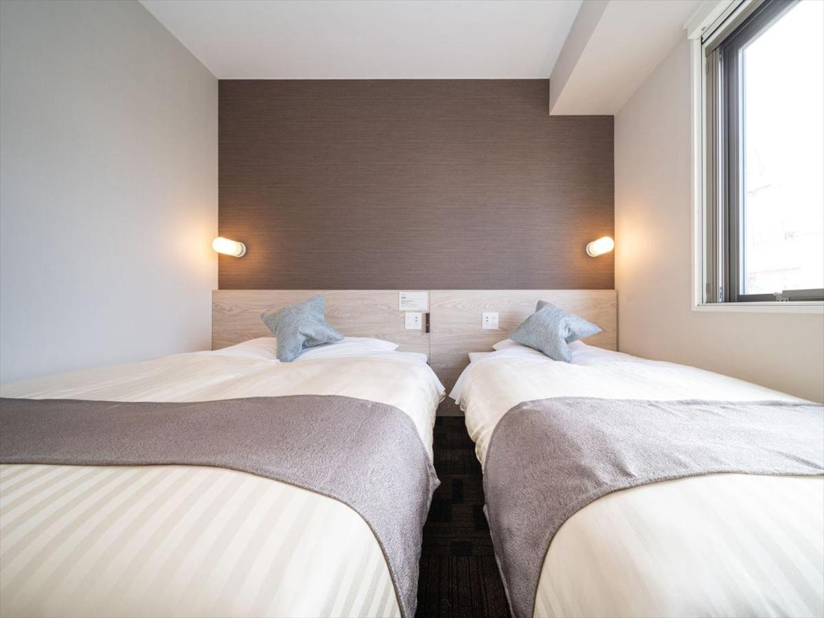 Twin Room - Photo 7