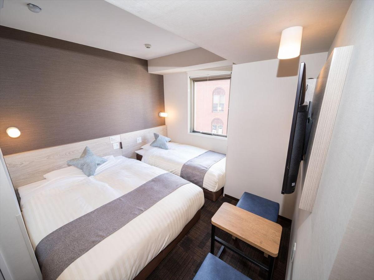 Twin Room - Photo 8