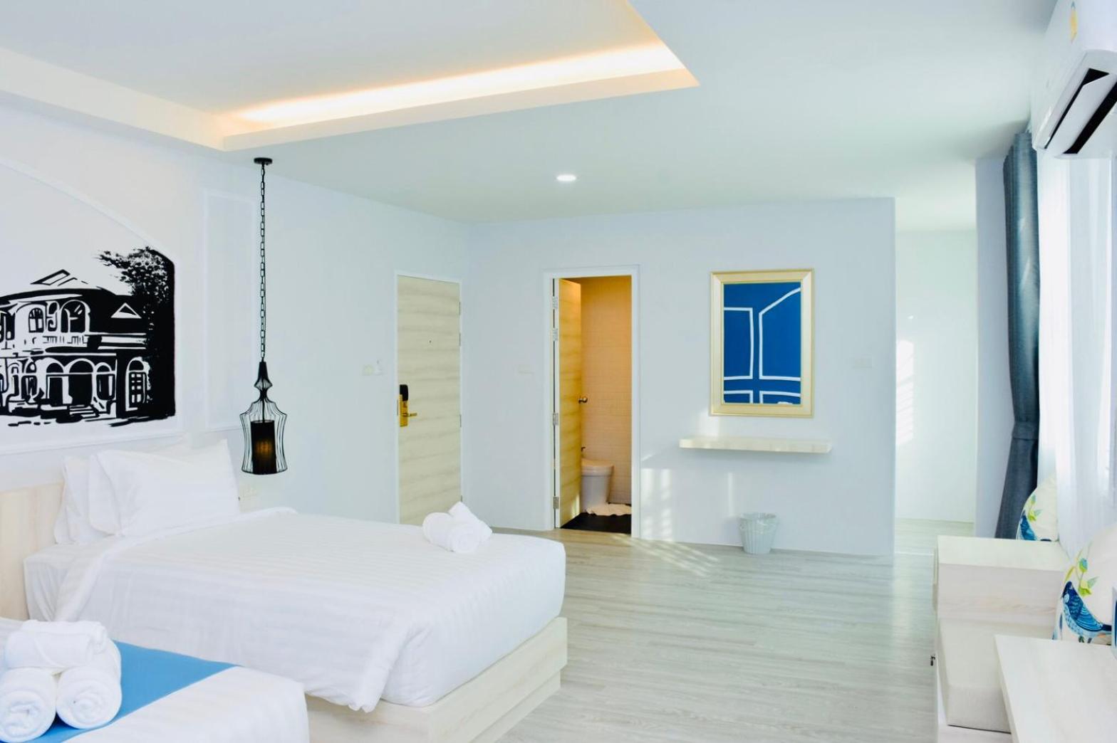 Deluxe Triple Room - Photo 22
