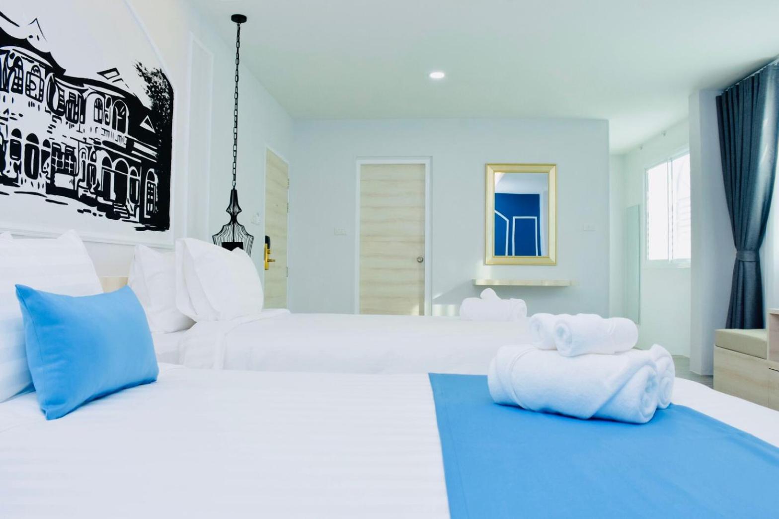 Deluxe Triple Room - Photo 21