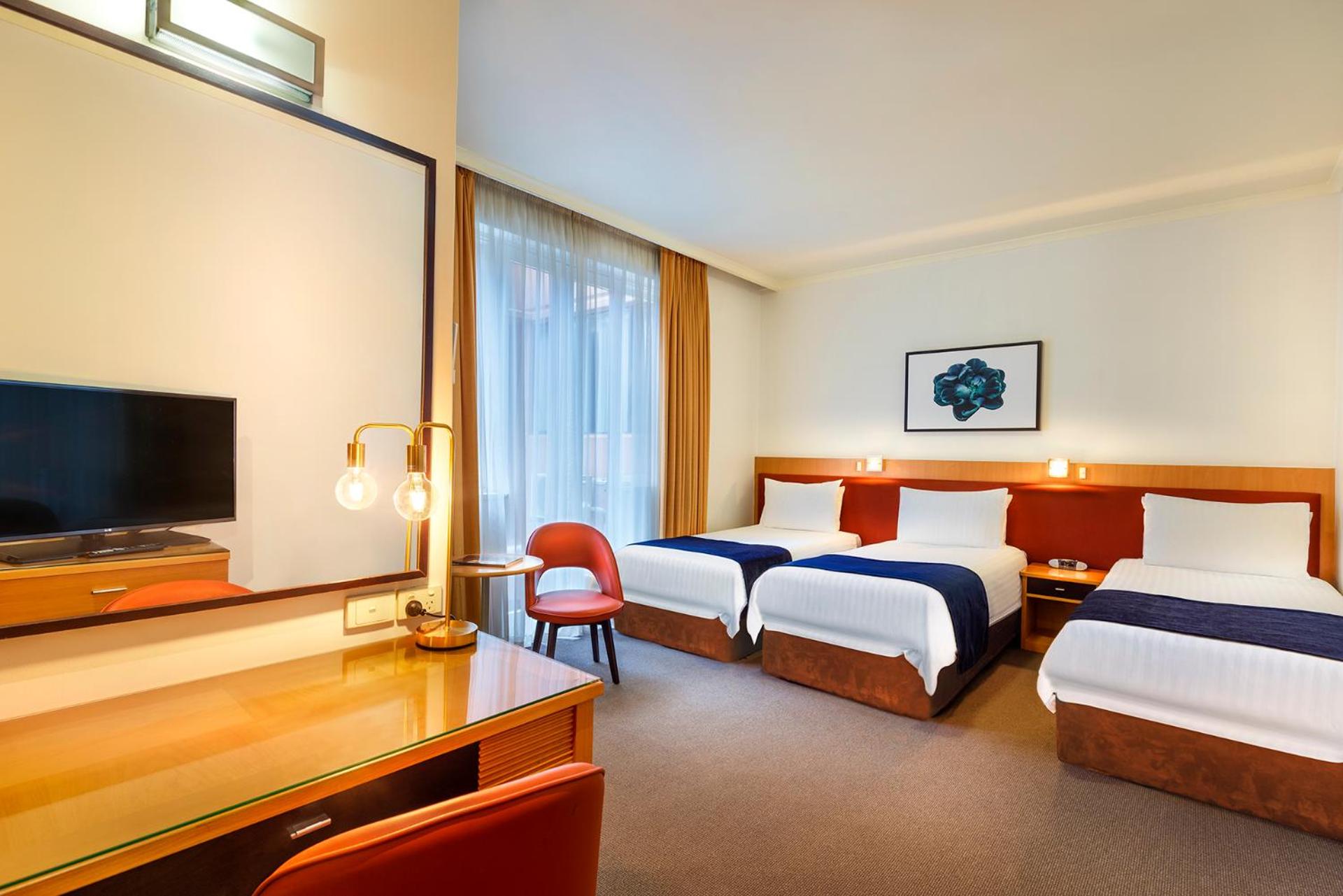 Deluxe Triple Room - Photo 7