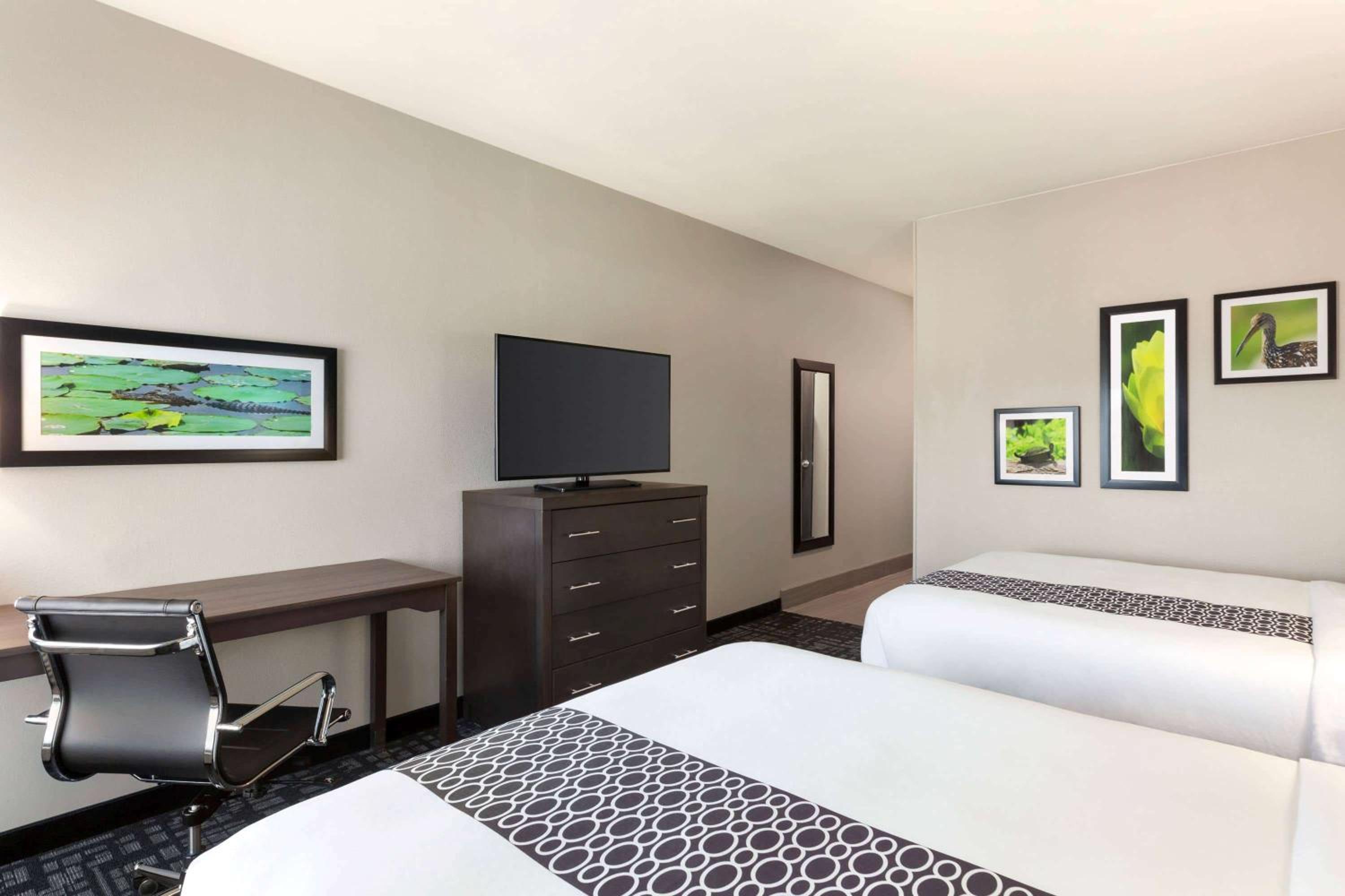 Queen Room with Two Queen Beds and Bath Tub - Mobility Accessible/Non-Smoking - Photo 1