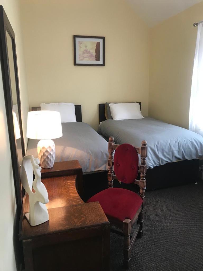 Basic Triple Room With Shared Bathroom photo 3