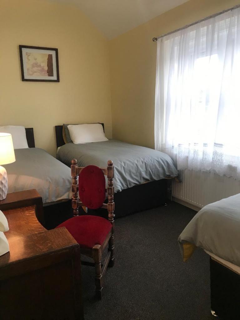 Basic Triple Room With Shared Bathroom photo 1