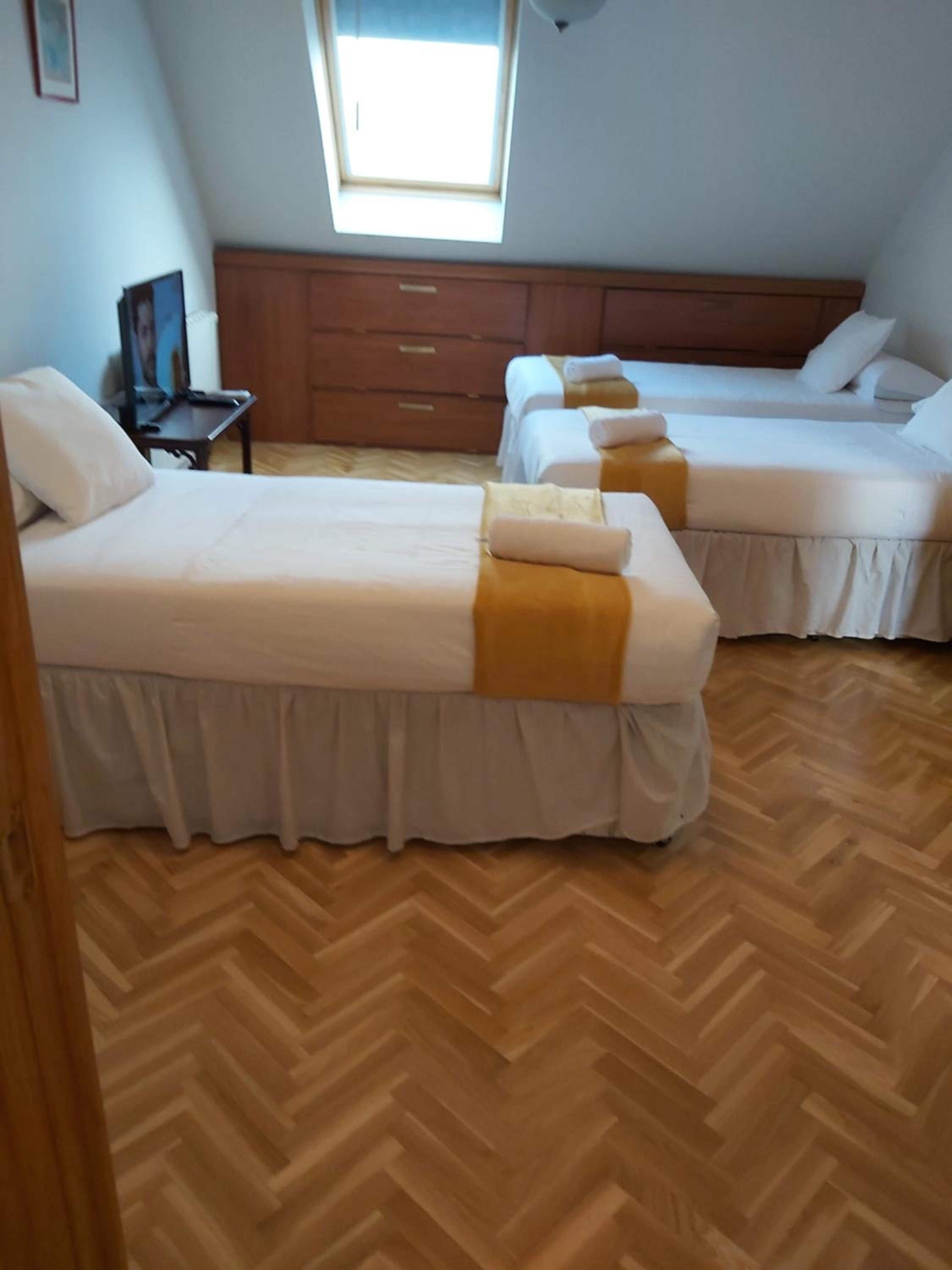 Triple Room with Private Bathroom - Photo 1