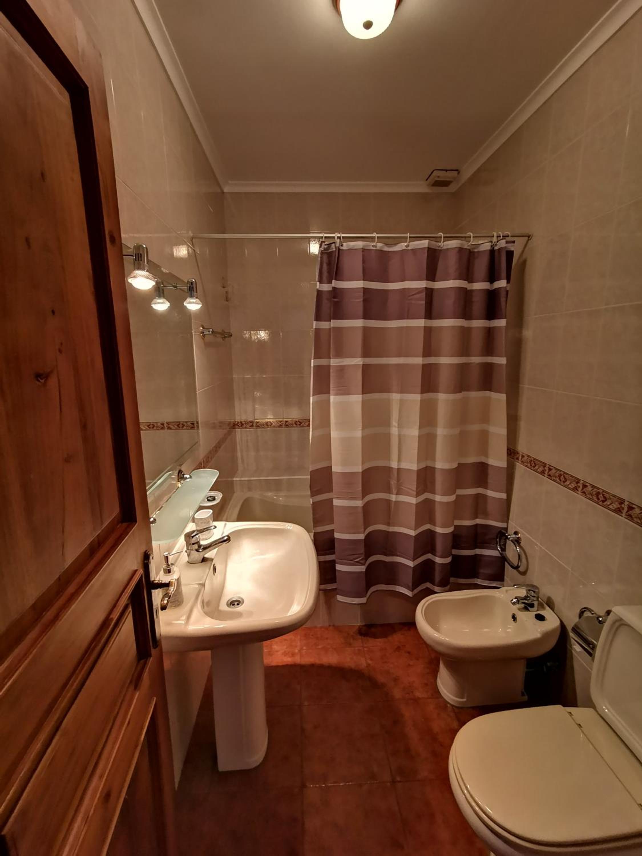 Three-Bedroom Apartment - Photo 10