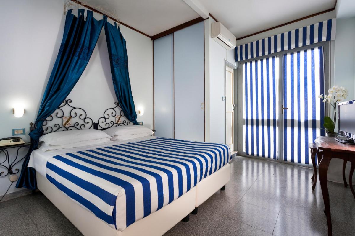 Double or Twin Room with Side Sea View