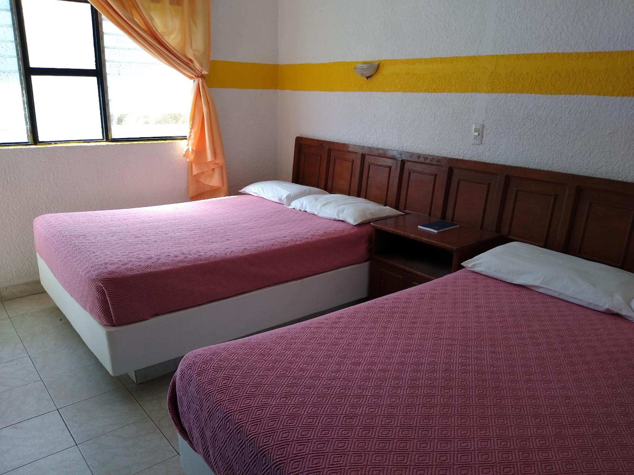 Queen Room with Two Queen Beds - Photo 5