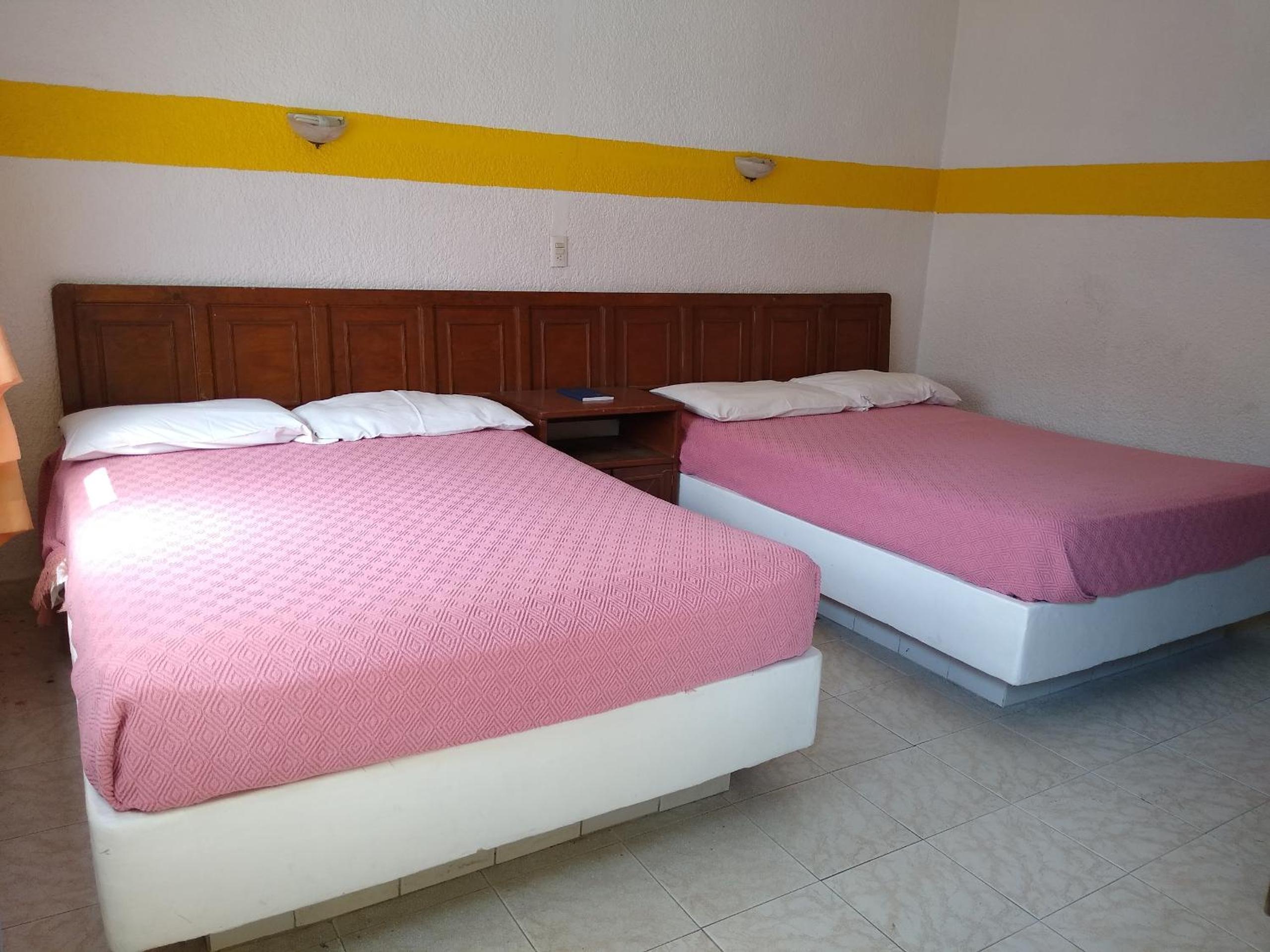 Queen Room with Two Queen Beds - Photo 1