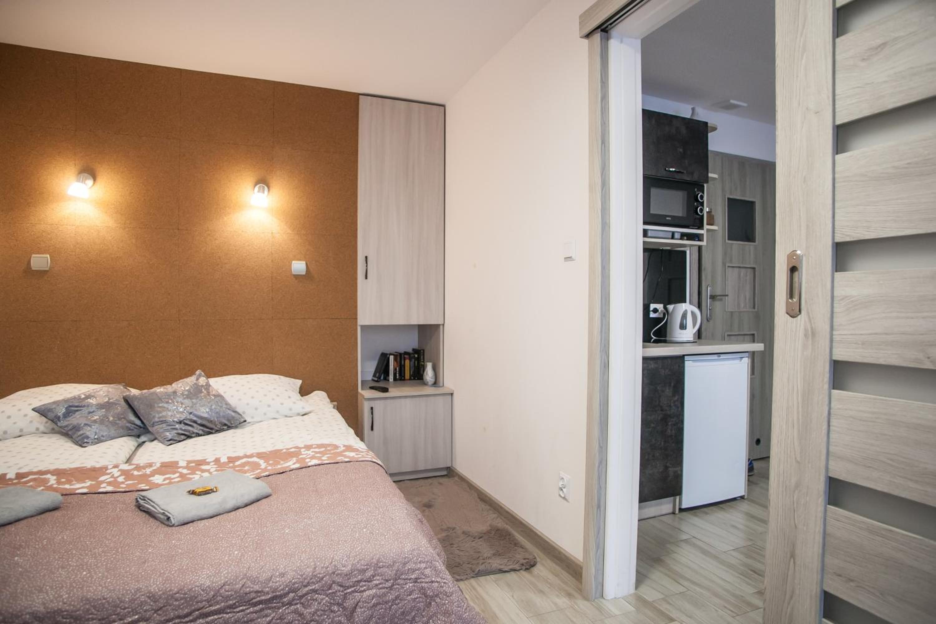 One-Bedroom Apartment with Balcony and Water View - Photo 12