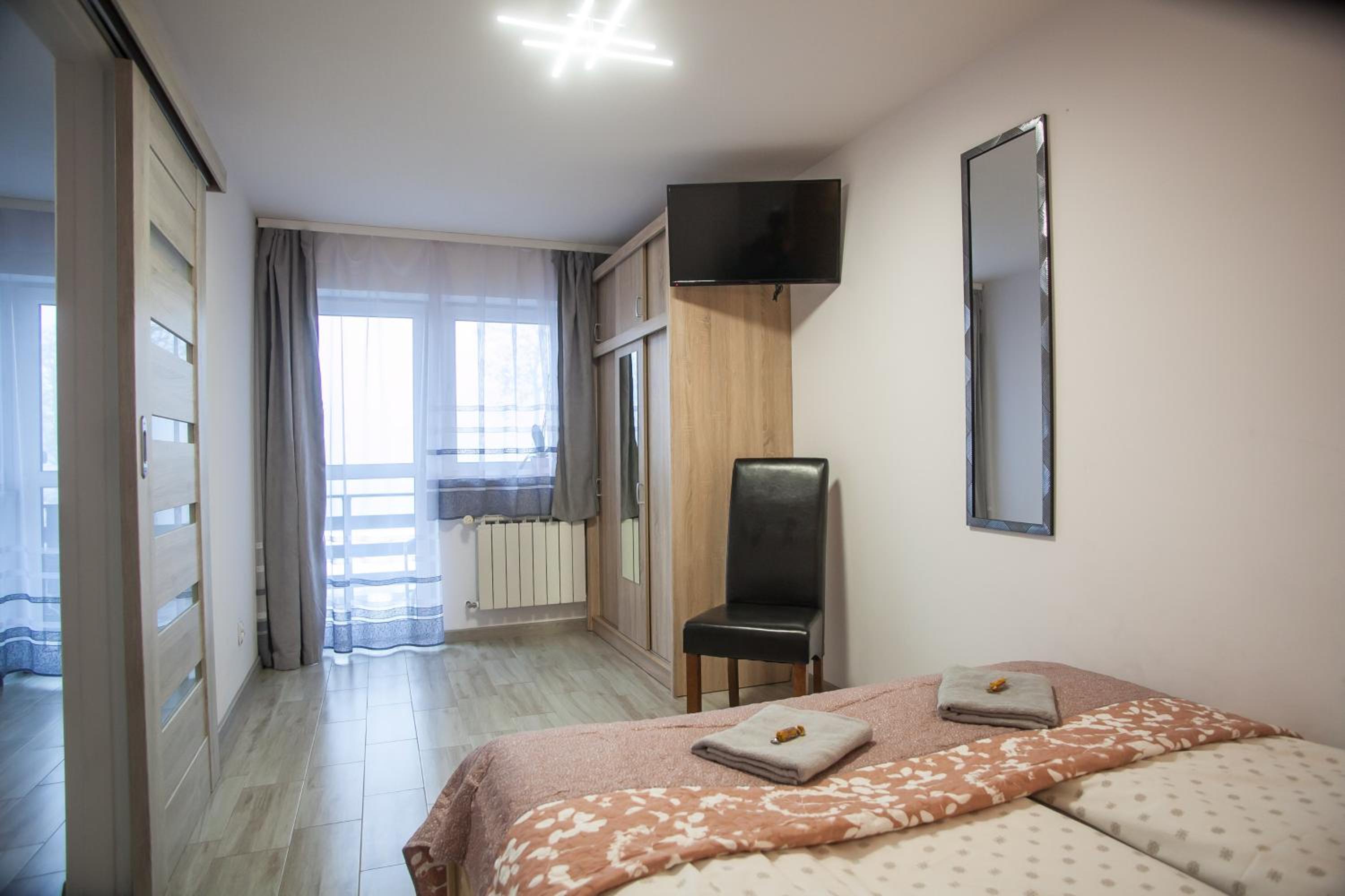 One-Bedroom Apartment with Balcony and Water View - Photo 14