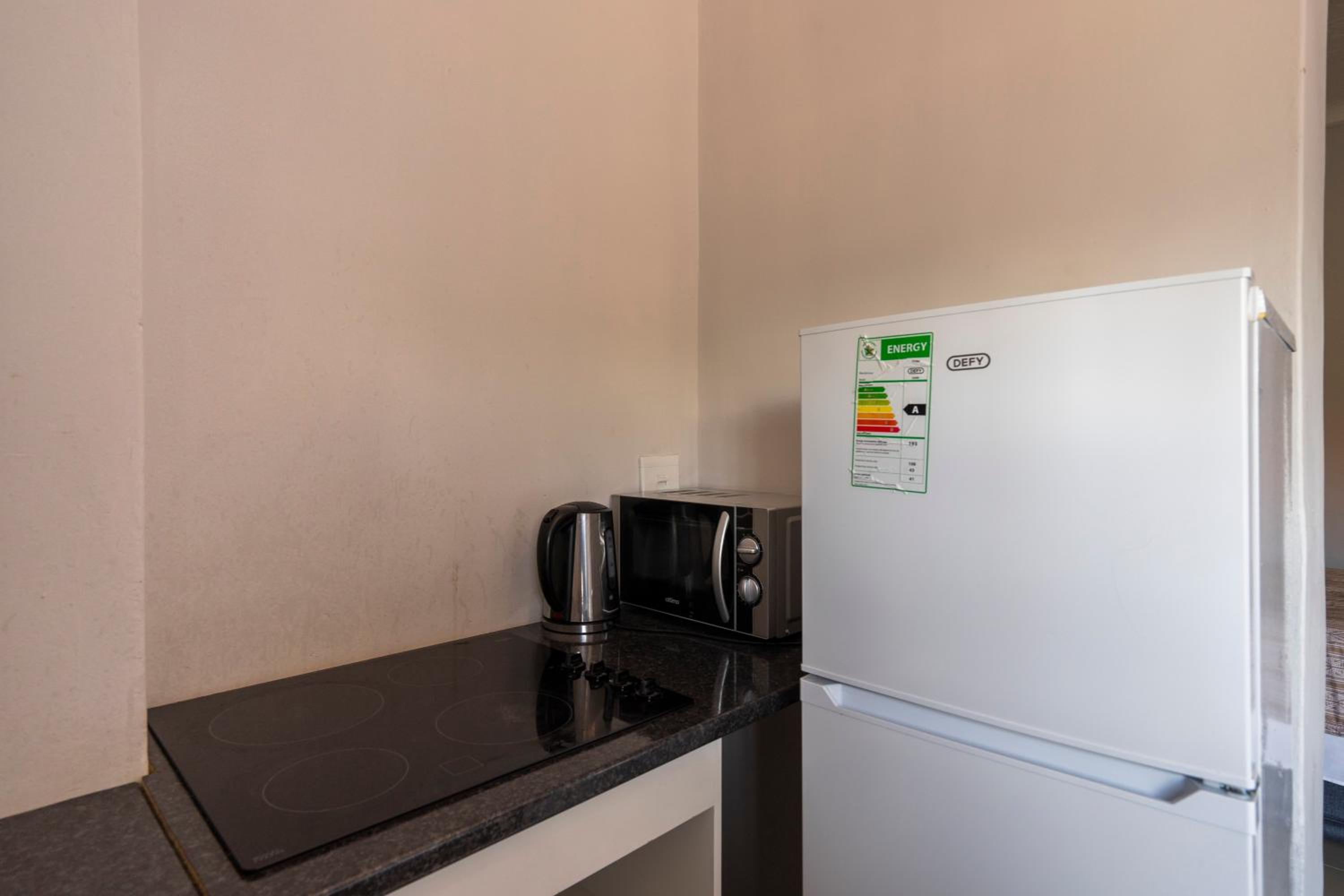 Deluxe Double Room (2 Adults + 1 Child) - Photo 8