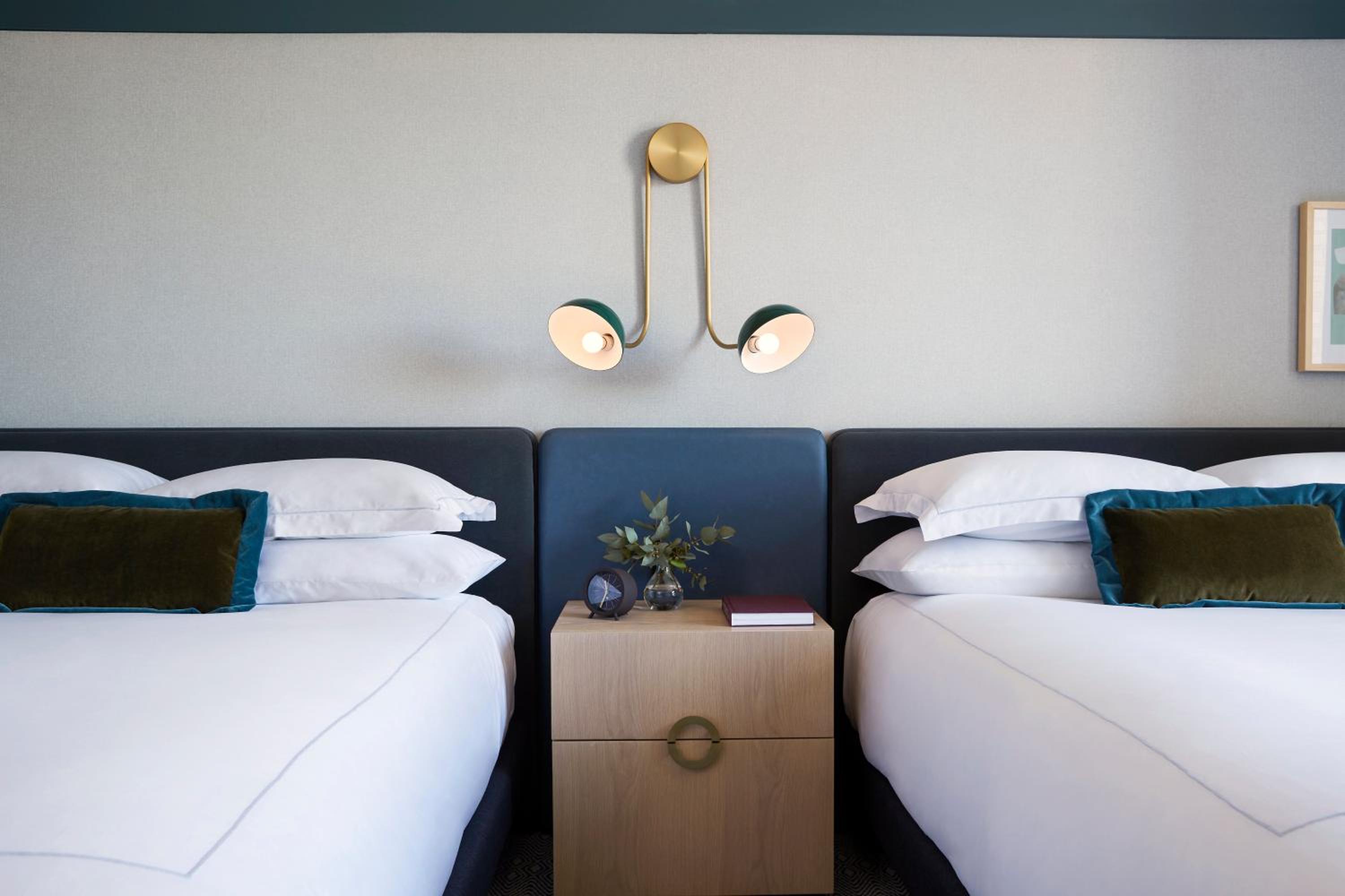 Premium Queen Room with Two Queen Beds and Walk-In Shower - Photo 2