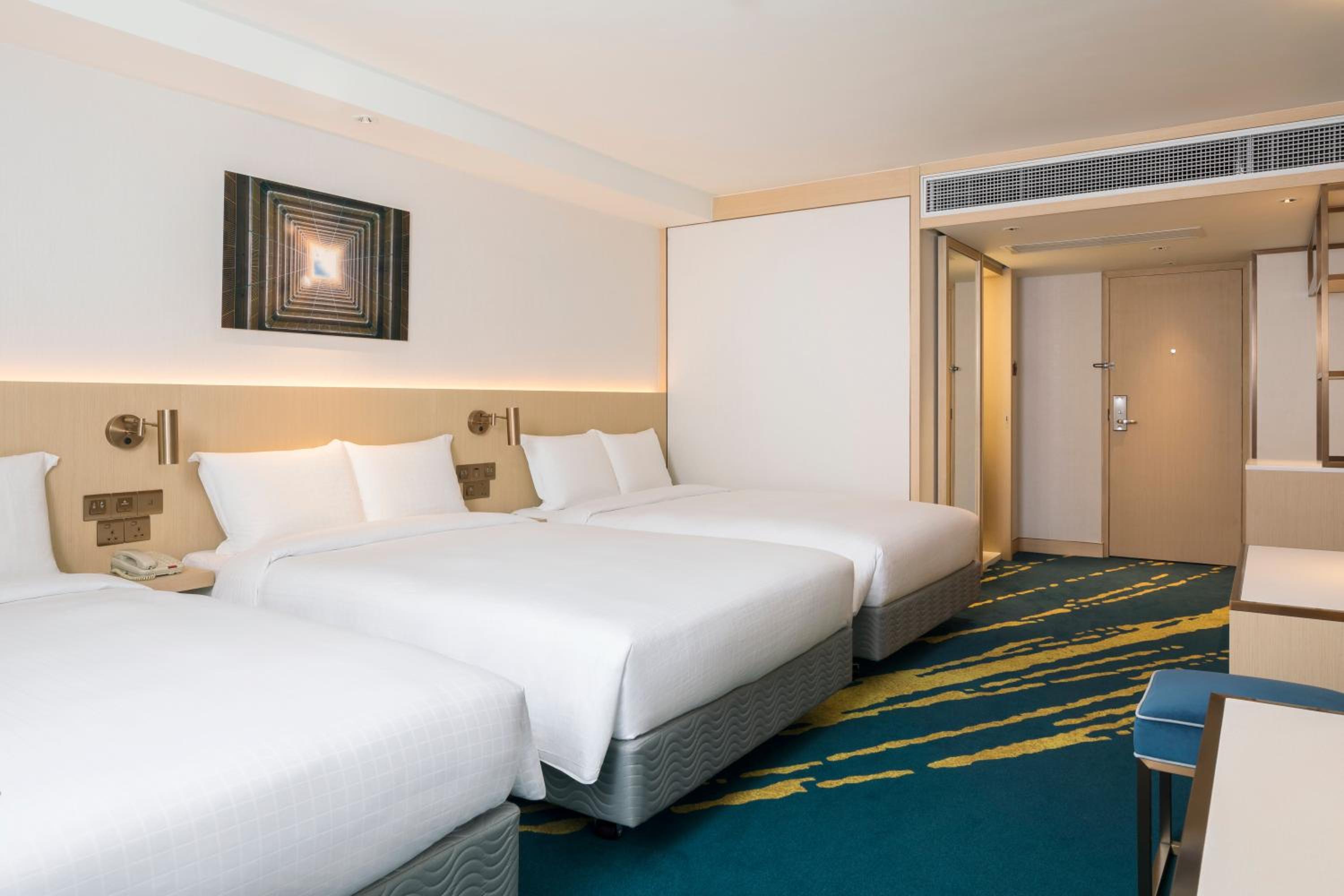 Premium Family Room with Three Double Beds thumbnail 5