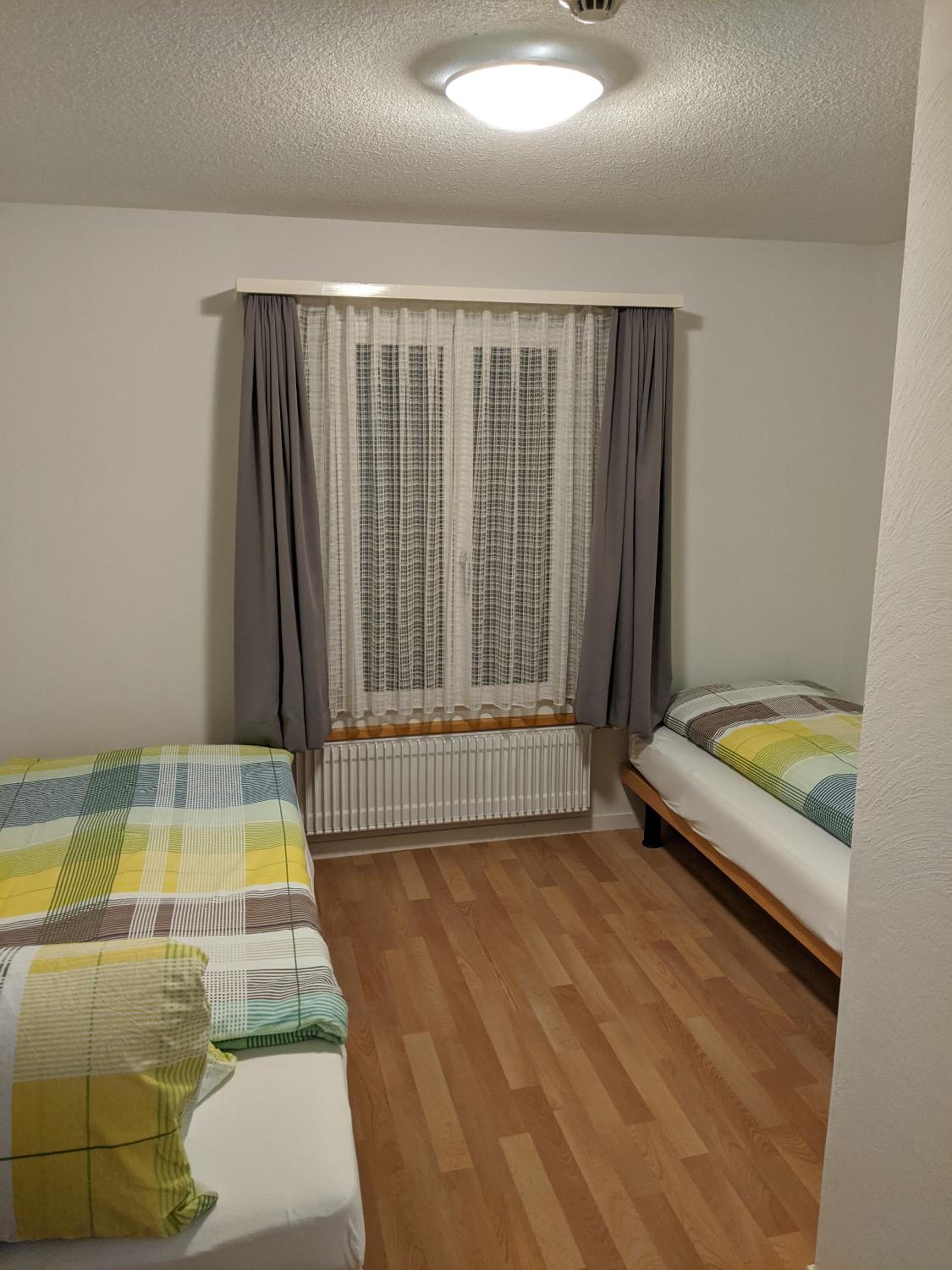 Family Room (2 Adults + 2 Children) with Balcony and Mountain View photo 3