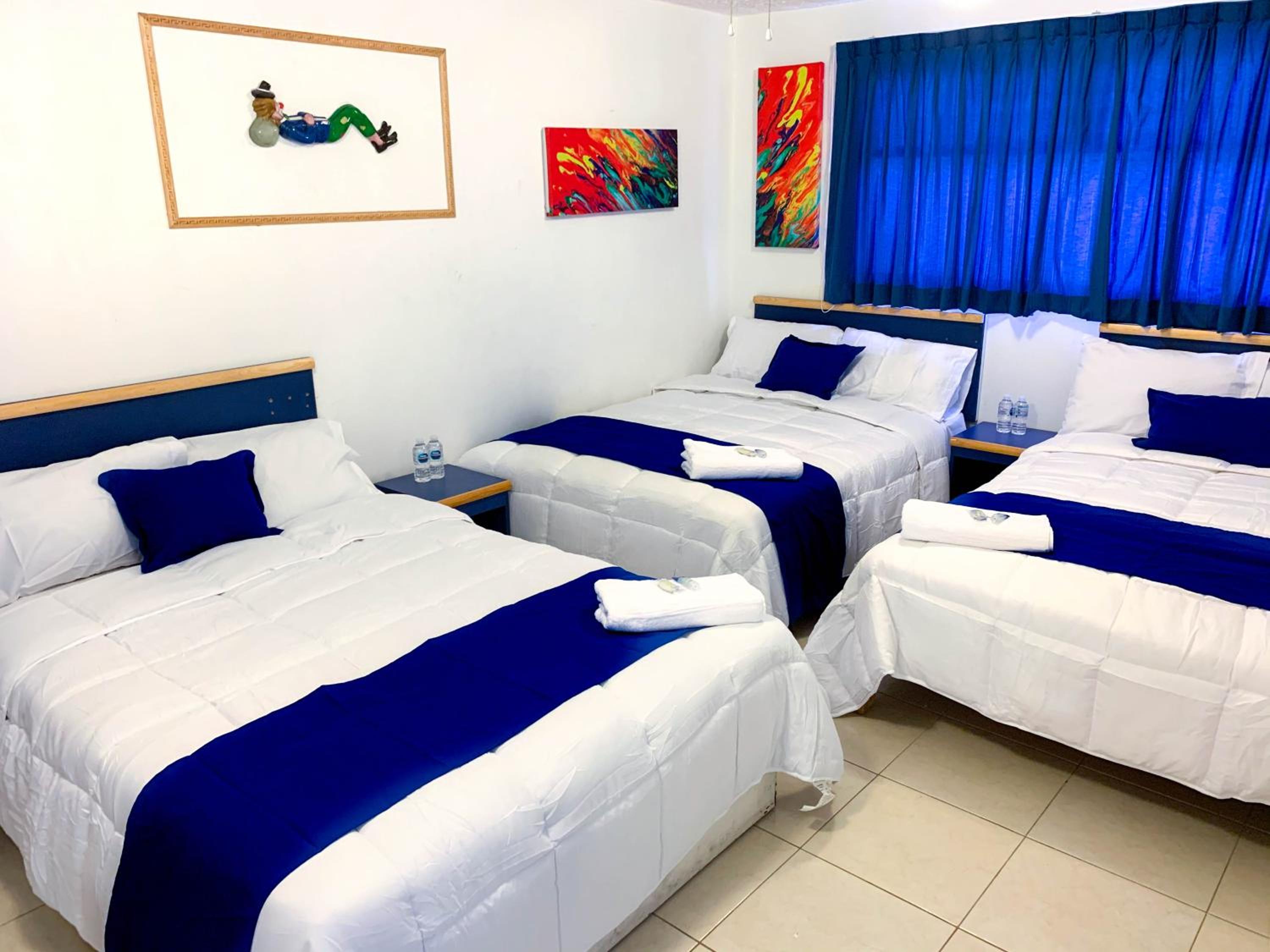 Deluxe Triple Room - Photo 1