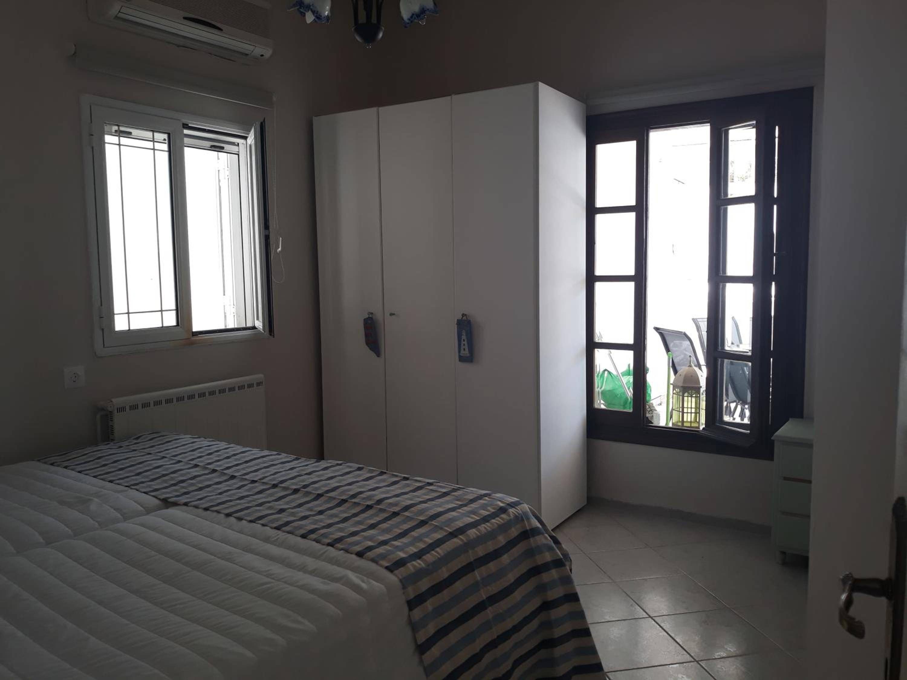 Two-Bedroom Apartment - Photo 32
