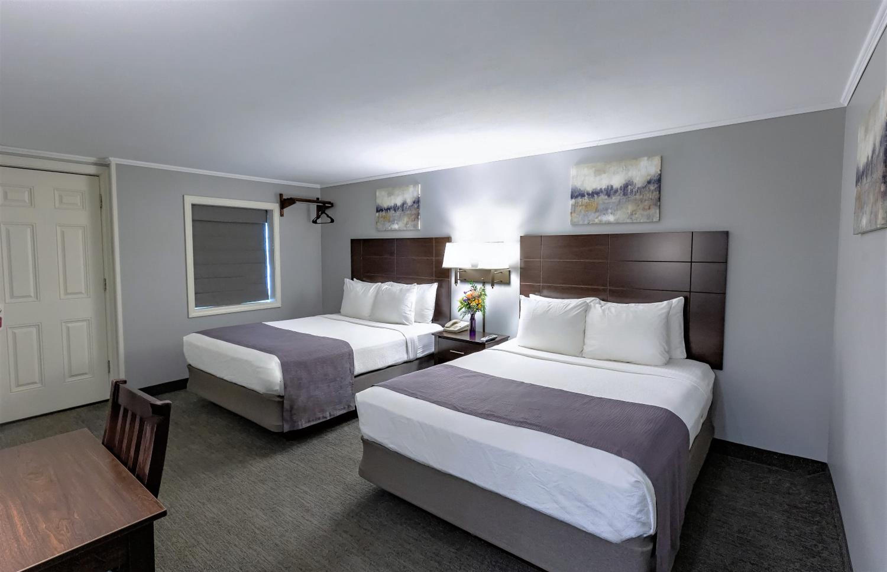Standard Queen Room with Two Queen Beds - Photo 1