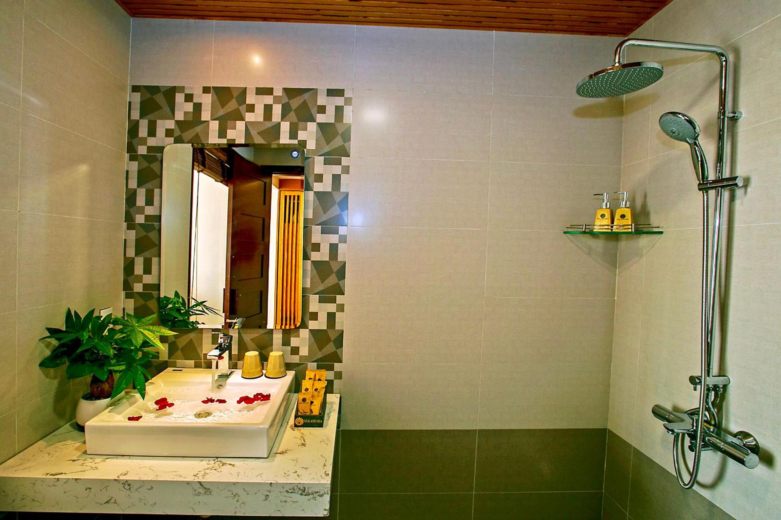 Deluxe Triple Room - Photo 8