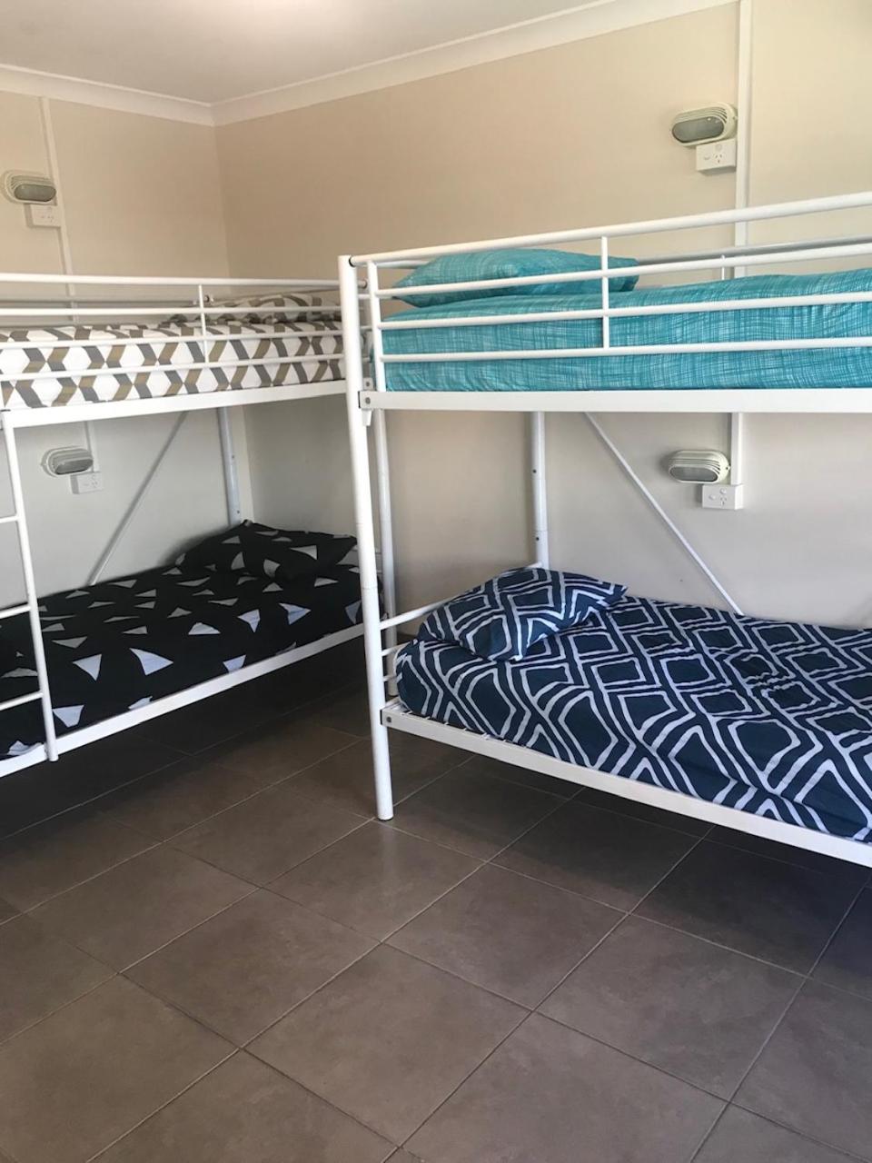 Bed in 4-Bed Dormitory Room with Shared Bathroom photo 1