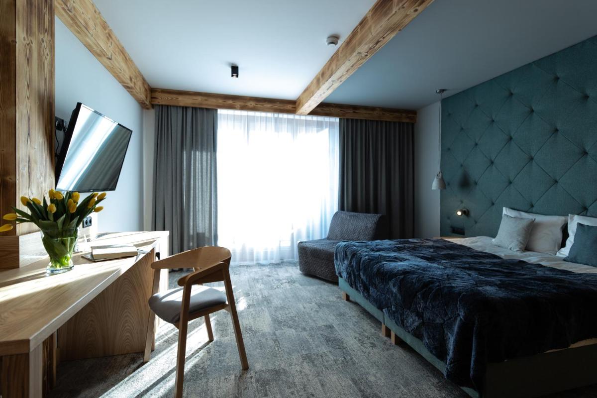 Deluxe Double Room (2 Adults + 1 Child) - Photo 4
