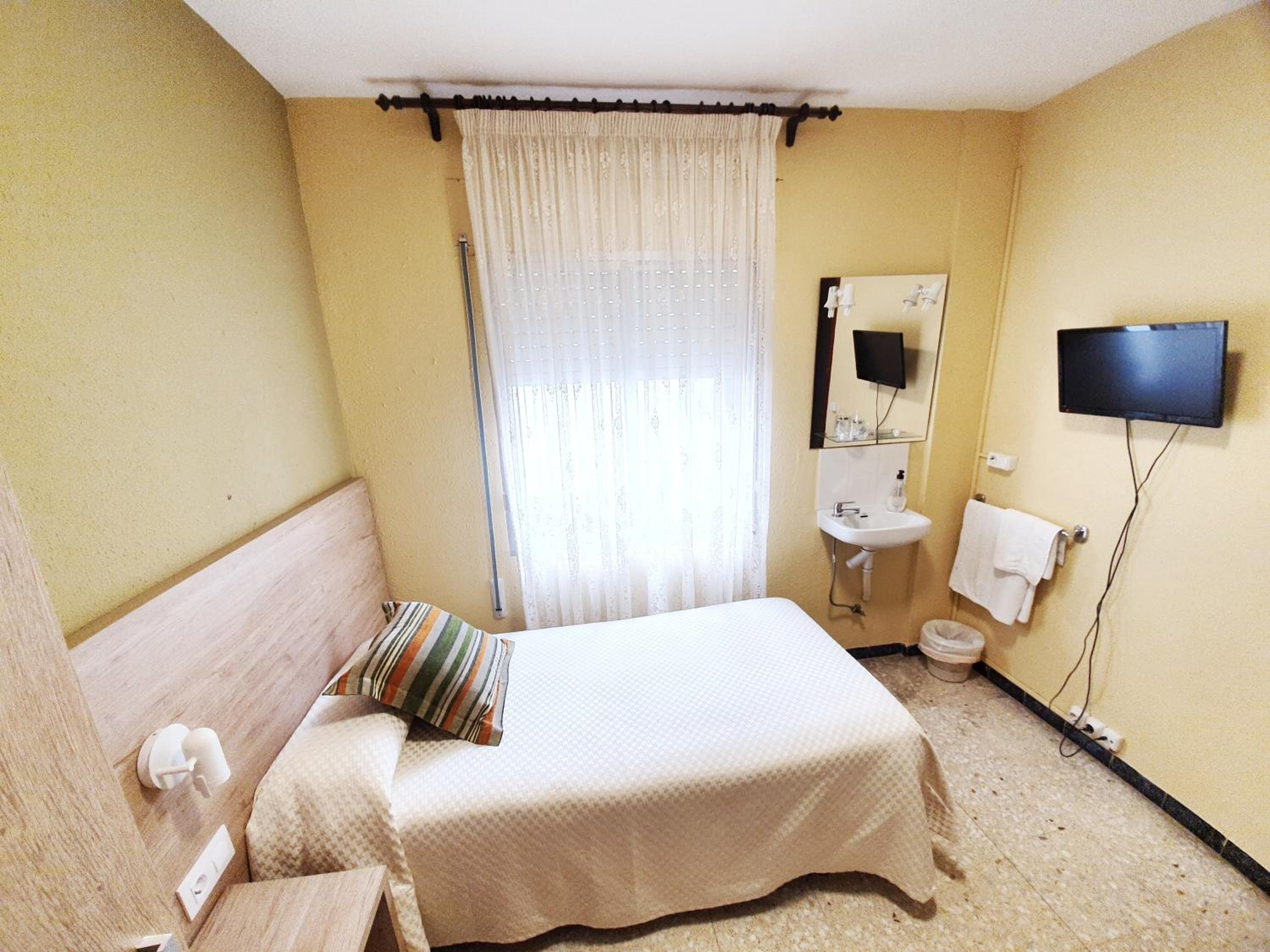 Habitación Individual Estándar con Baño Compartido