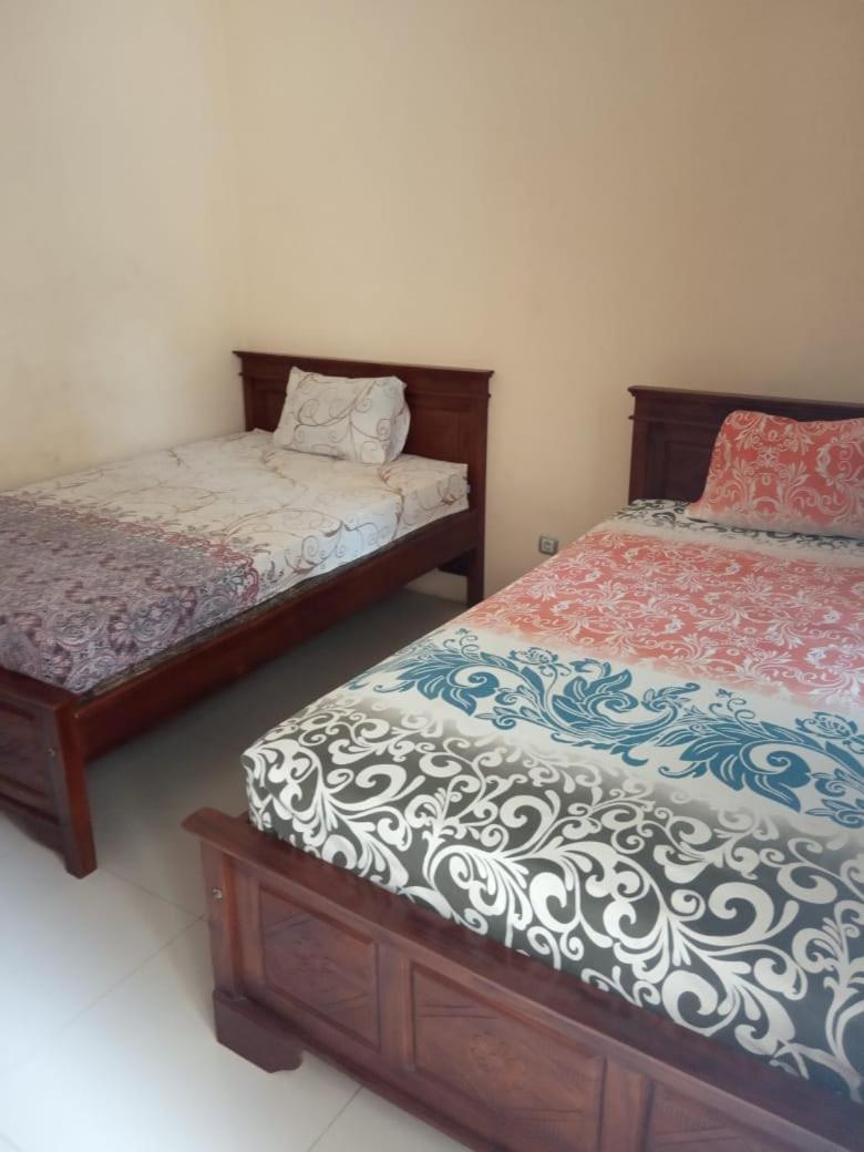 Deluxe Queen Room with Two Queen Beds photo 1