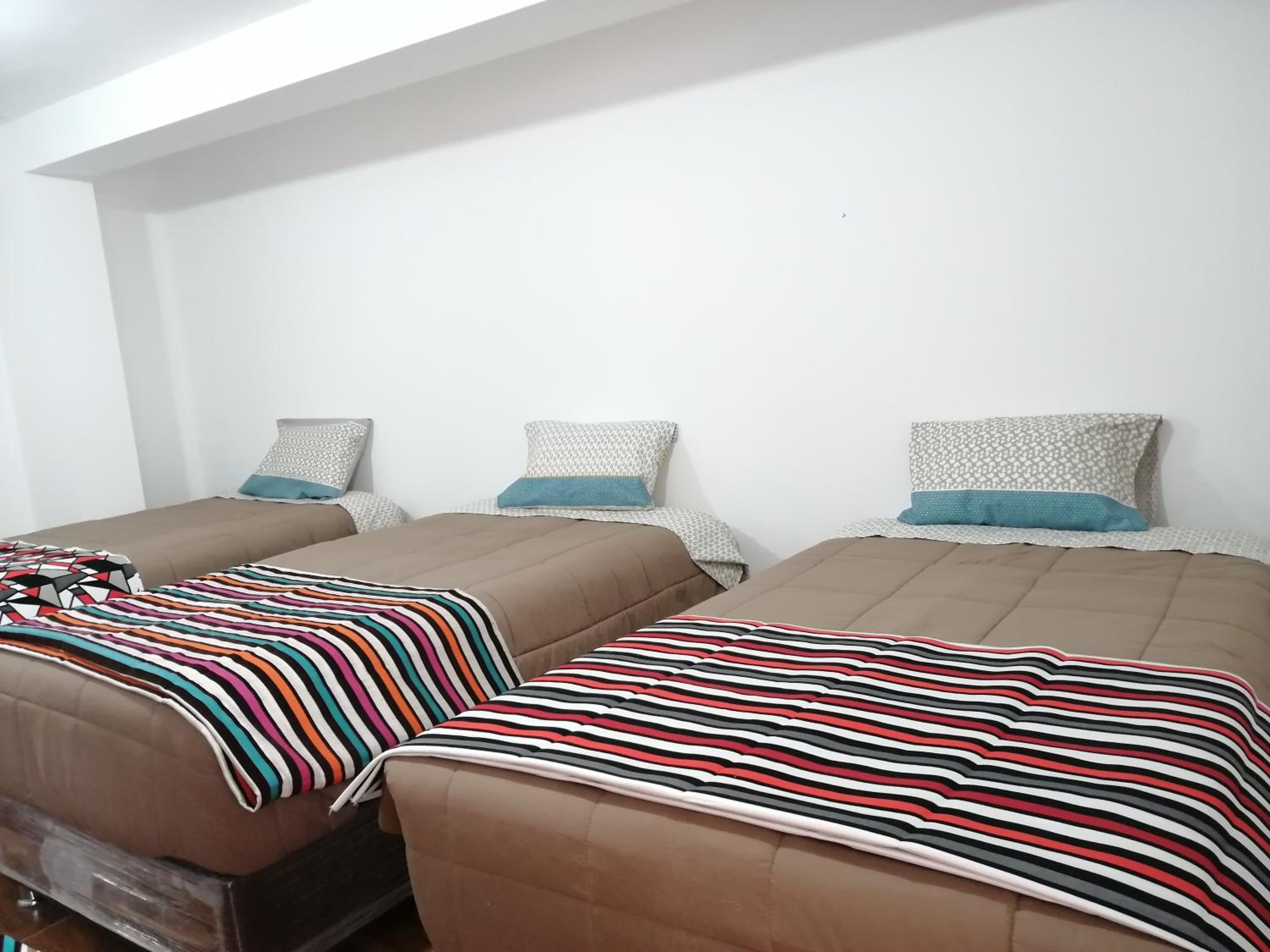 Quadruple Room with Private Bathroom