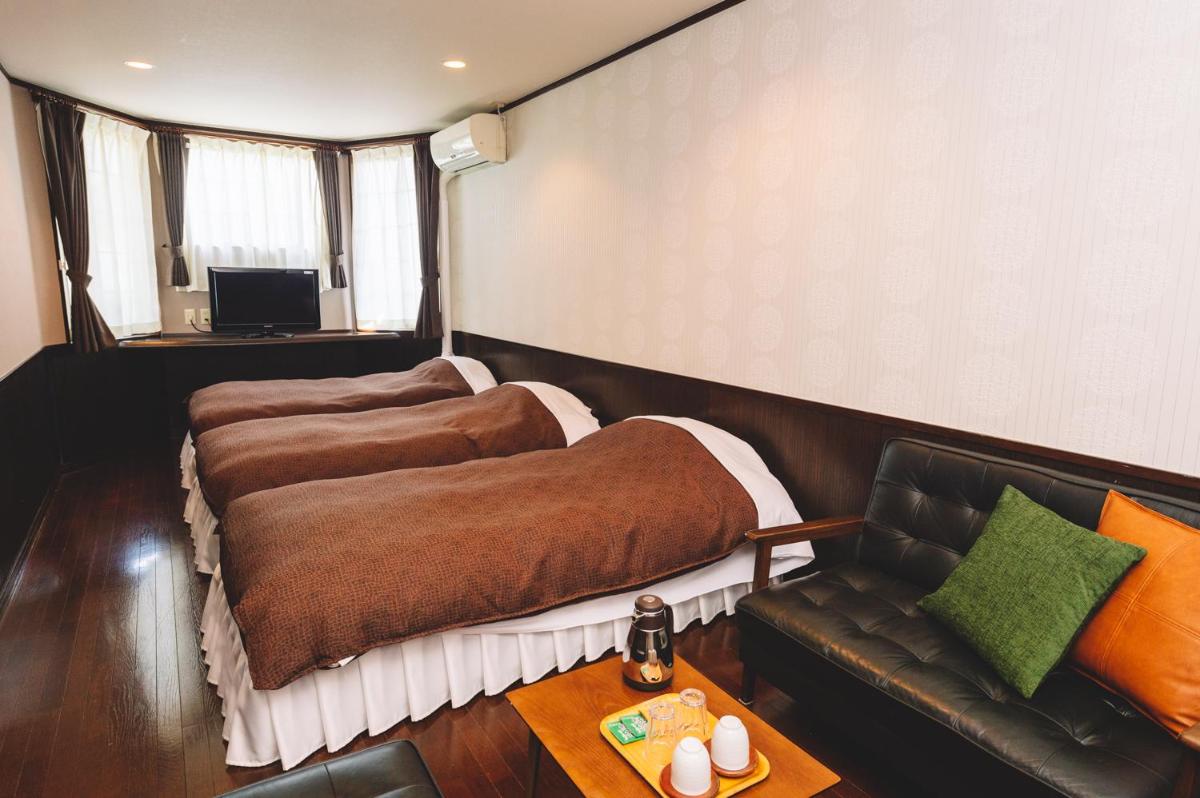 Standard Triple Room - Photo 1