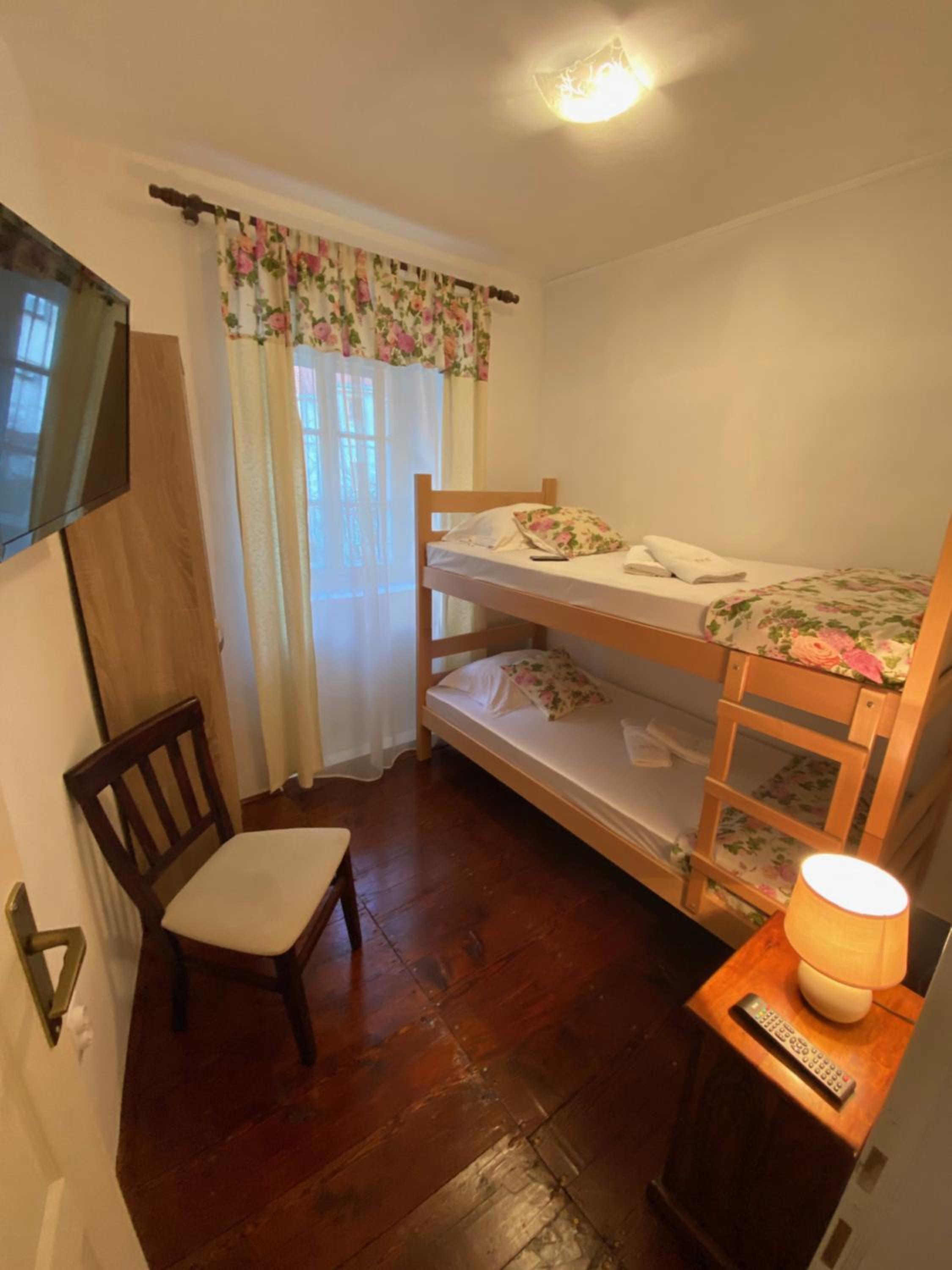 Economy Room with Bunk Beds and Shared Bathroom