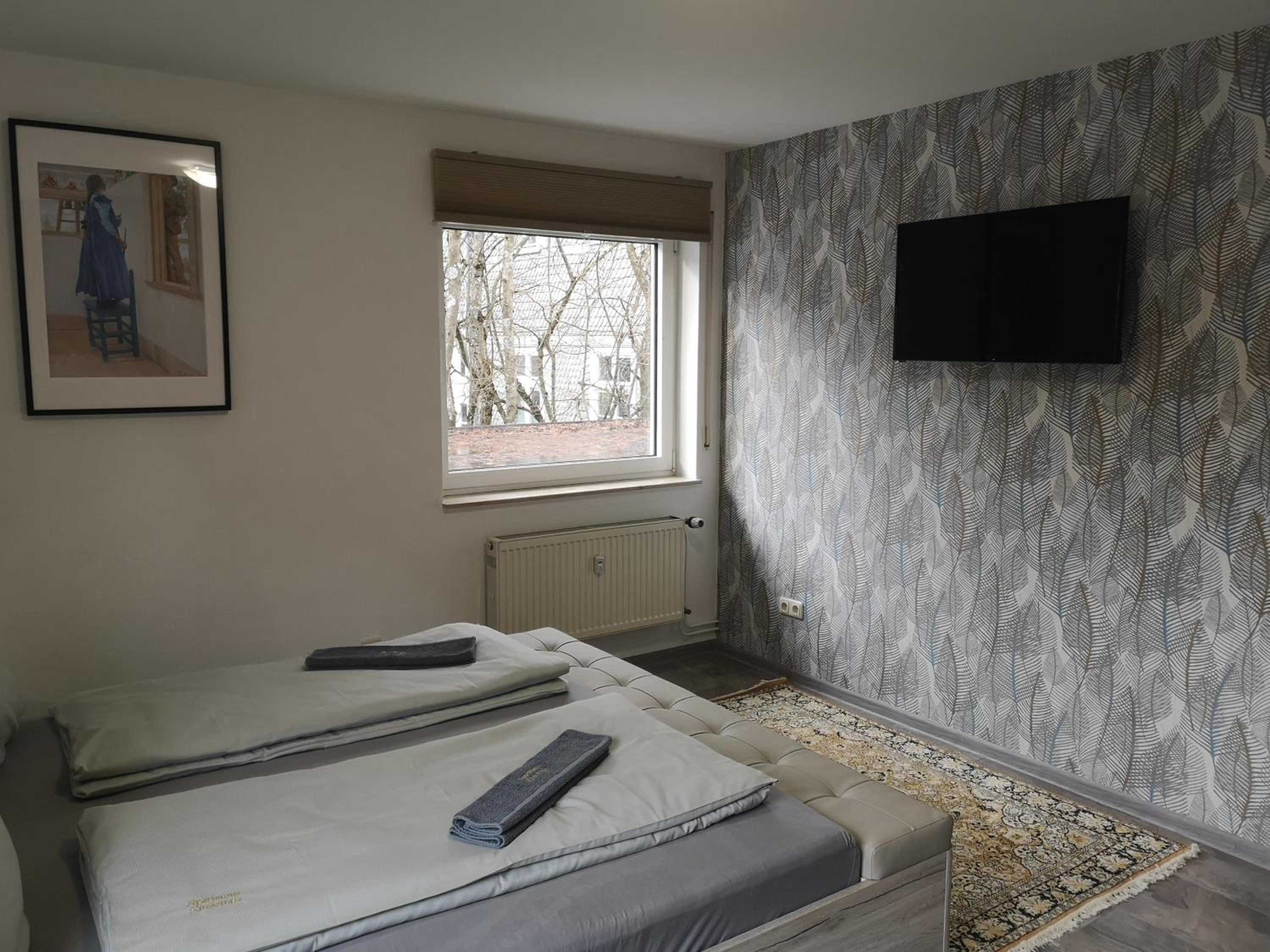 Three-Bedroom Apartment - Photo 4