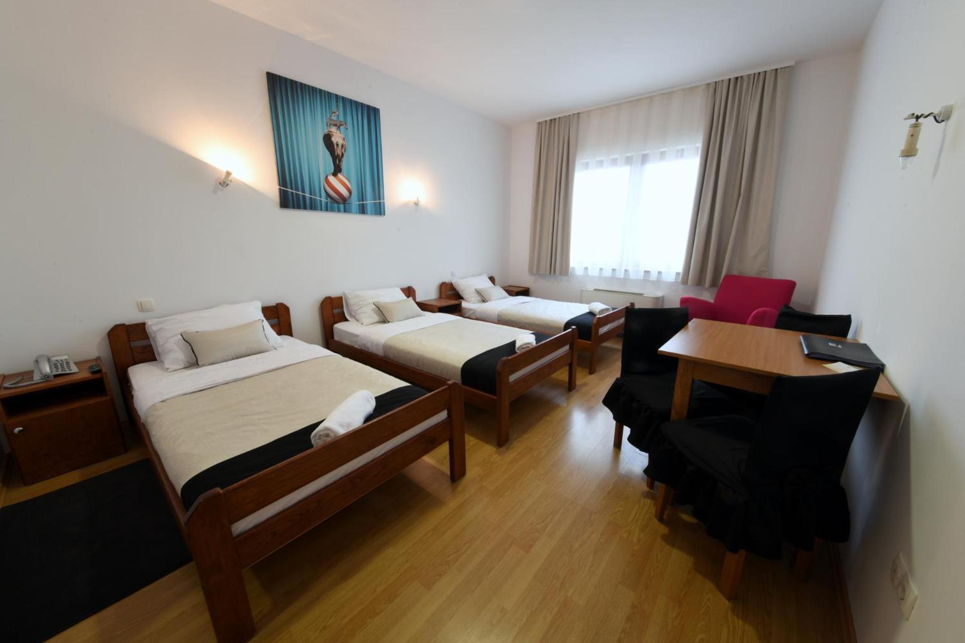 Triple Room - Photo 1