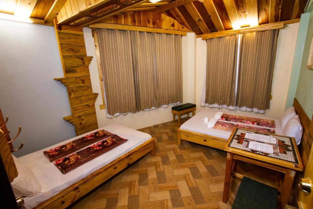 Quadruple Room with Private Bathroom - Photo 1