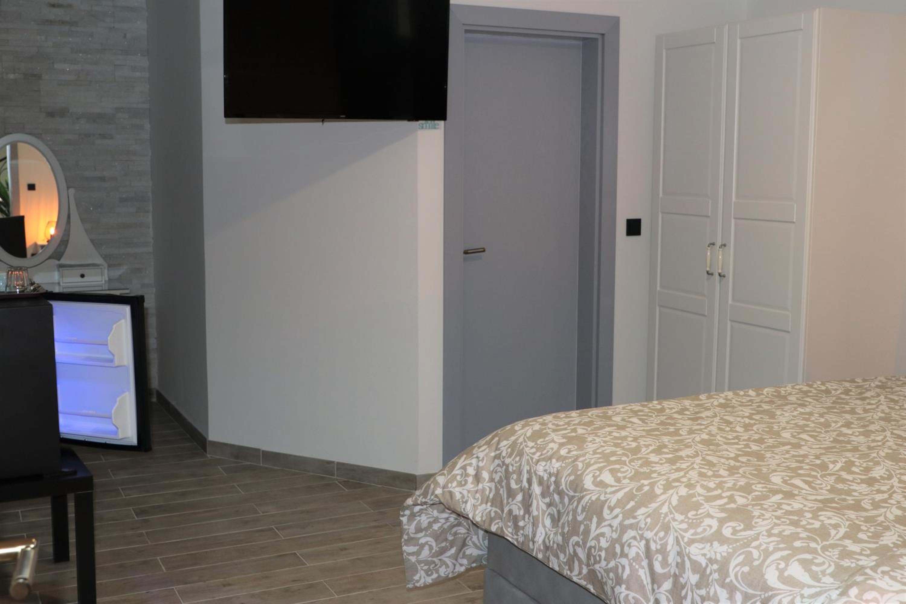 Deluxe Triple Room - Photo 7