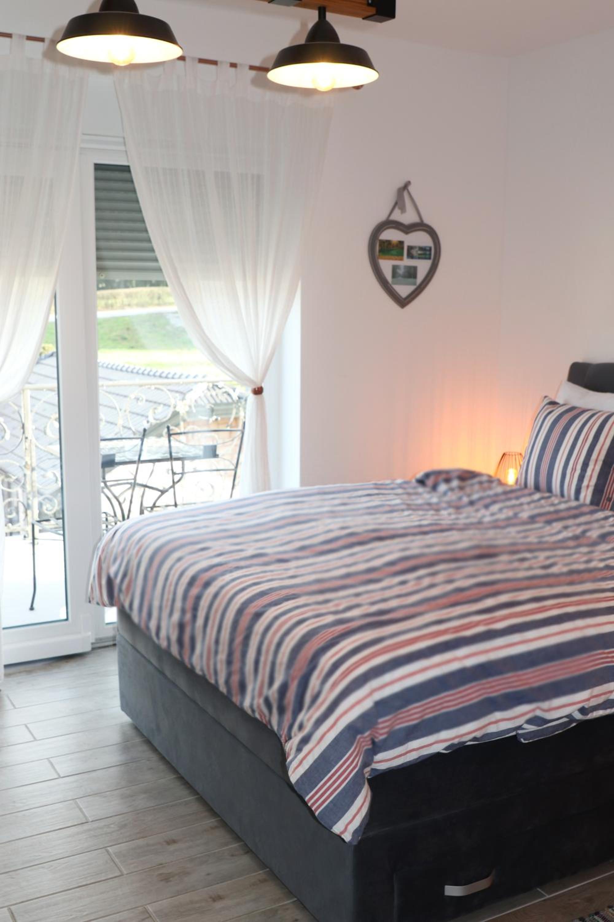 Deluxe Double Room with Balcony - Photo 9