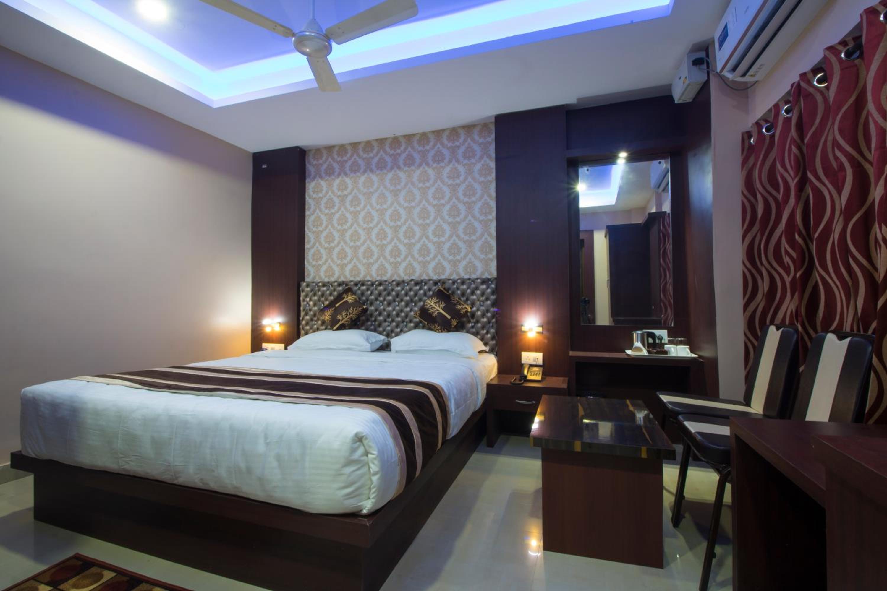Deluxe Room - Photo 2