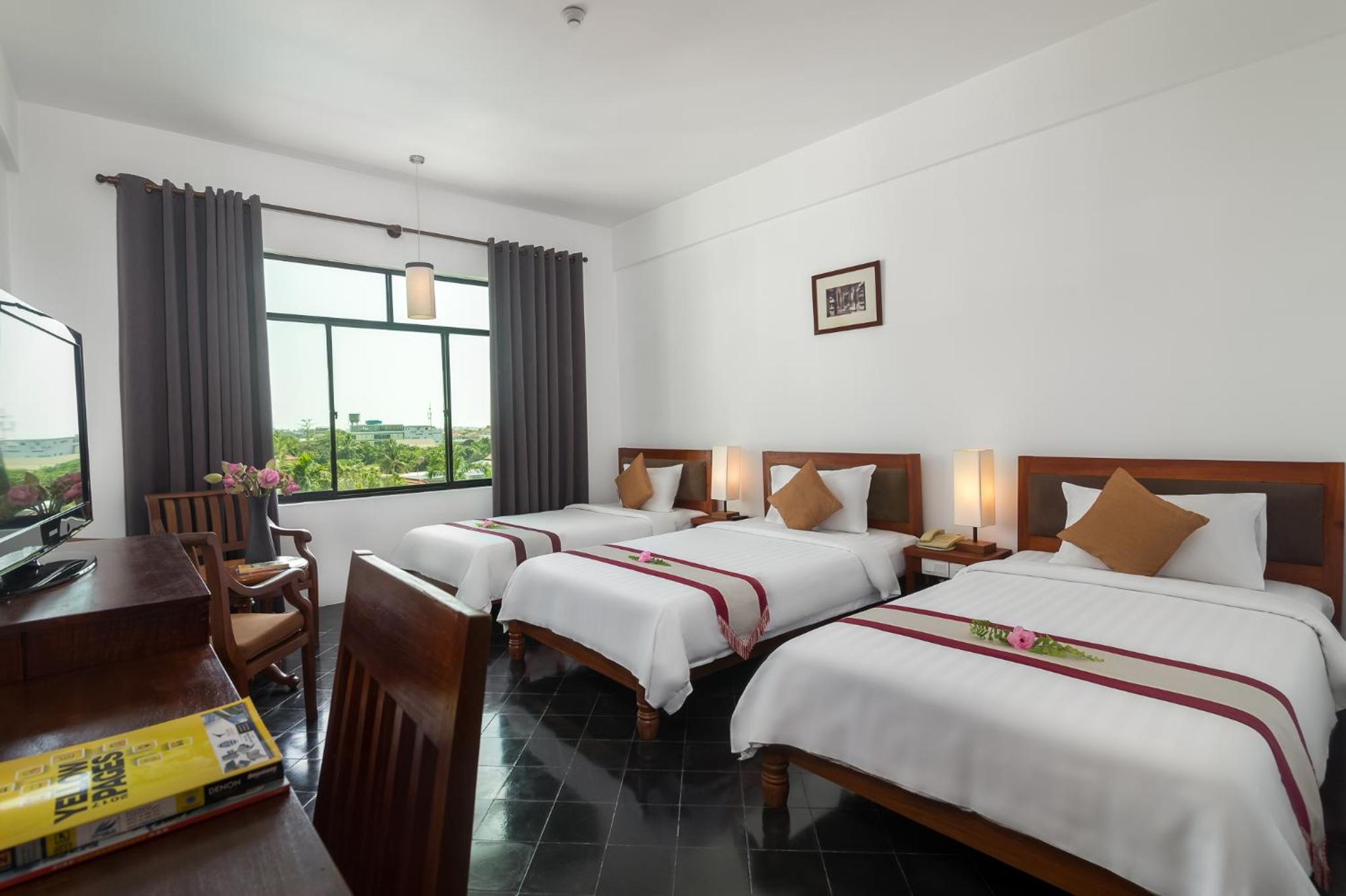 Deluxe Triple Room - Photo 5