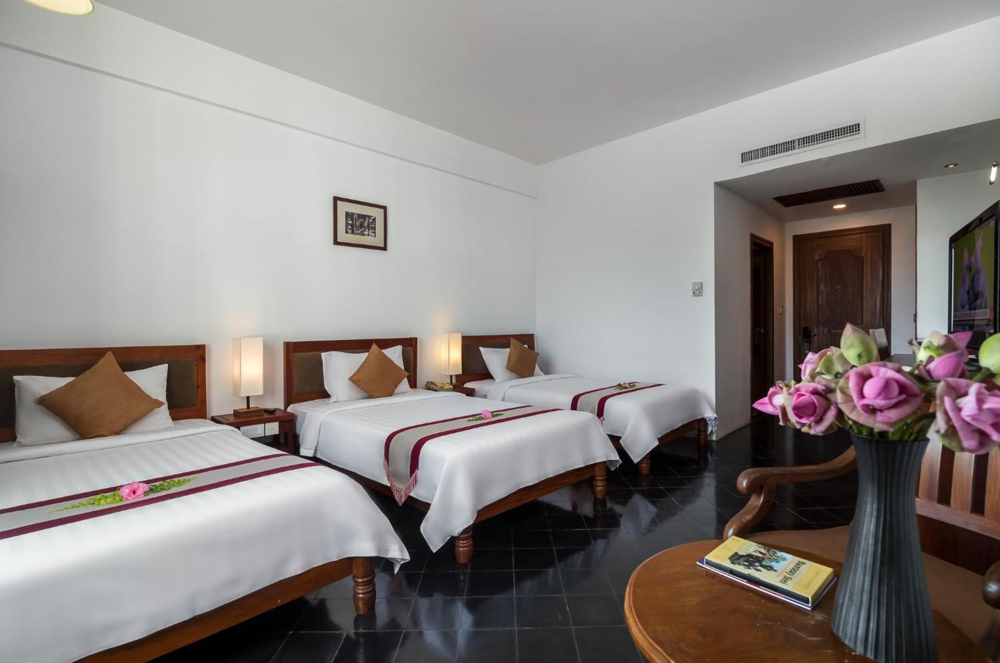 Deluxe Triple Room - Photo 6