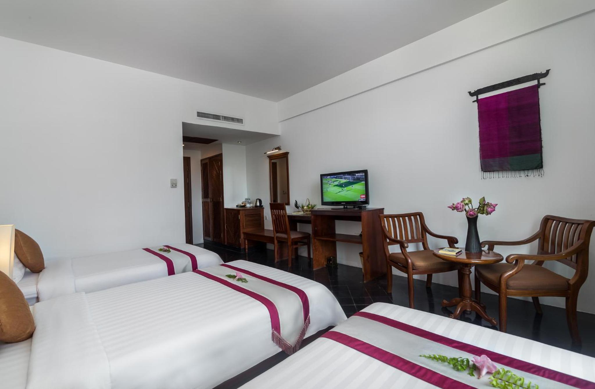 Deluxe Triple Room - Photo 1