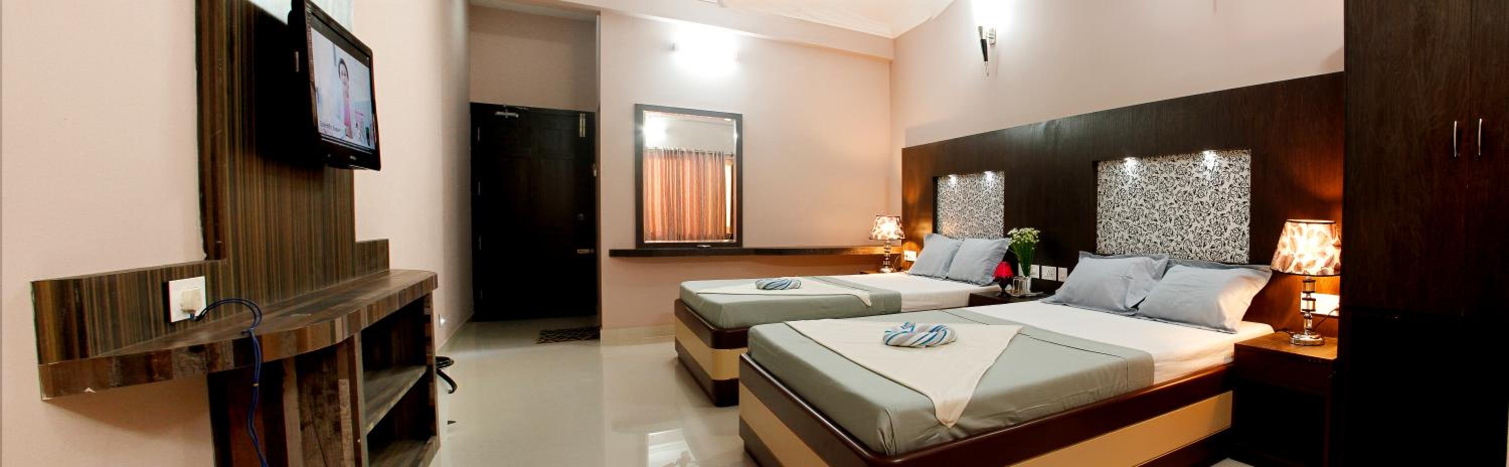 Deluxe Quadruple Room - Photo 1