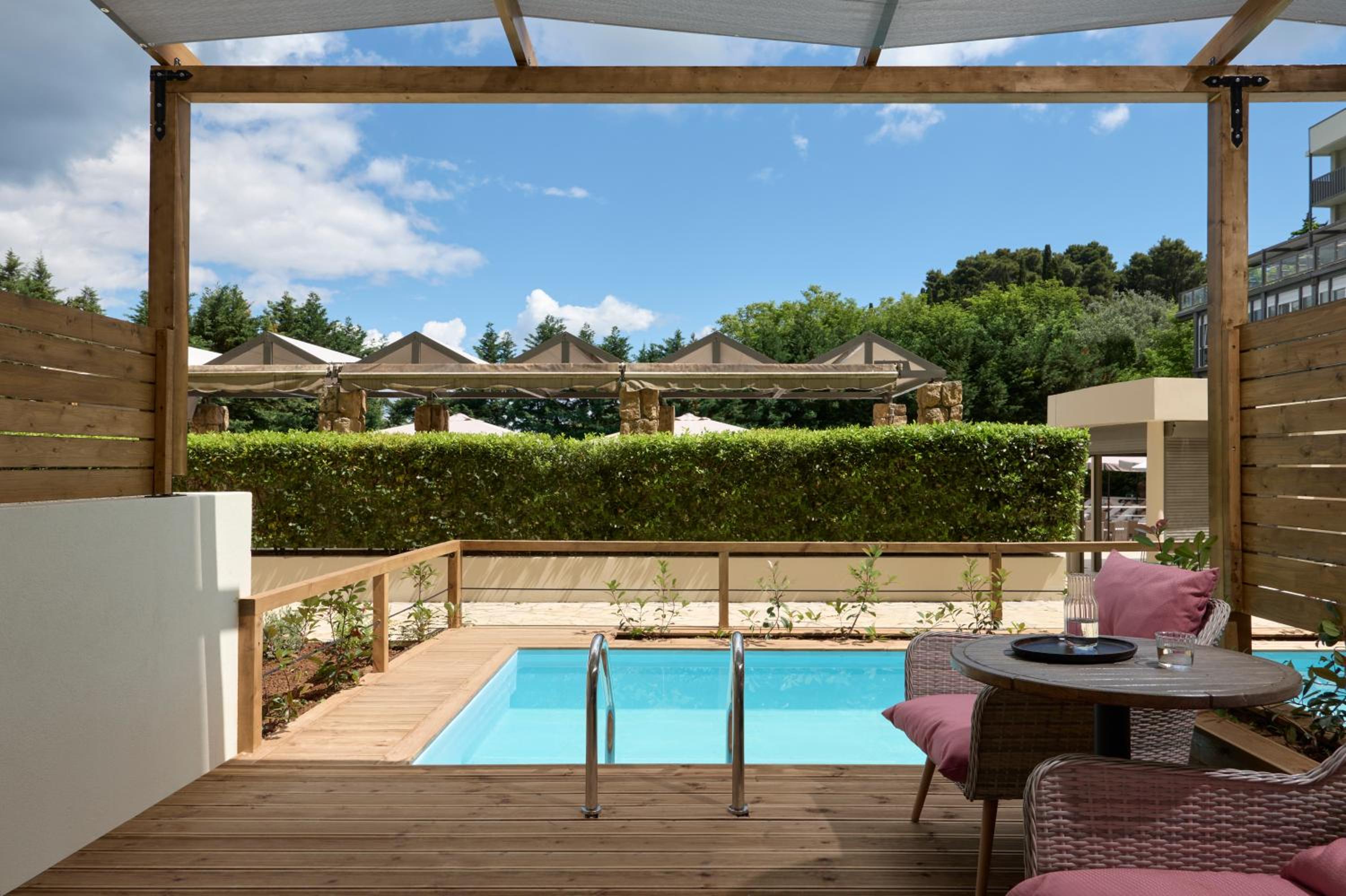 Double or Twin Room with Sharing Pool photo 2