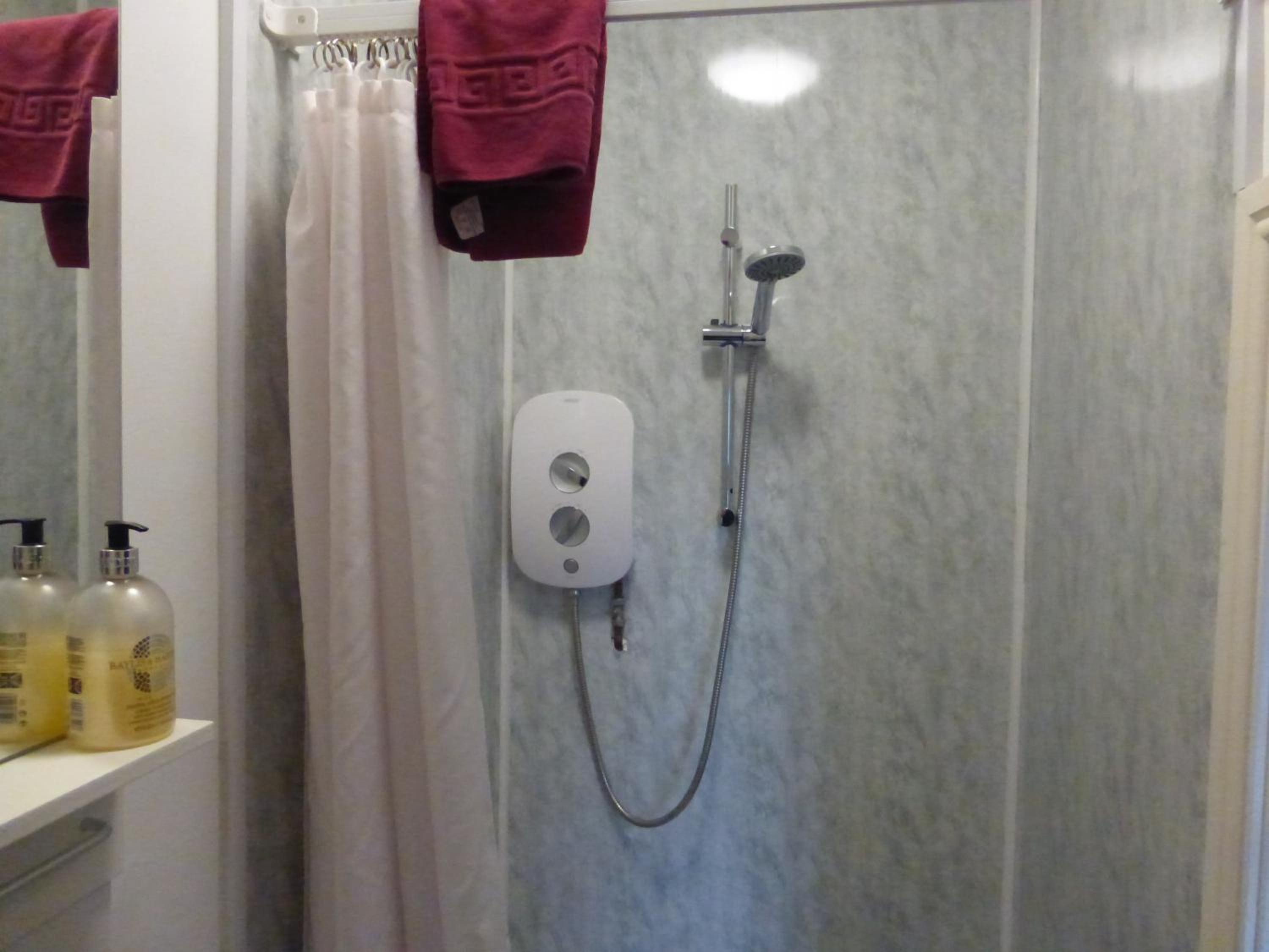 Quadruple Room with Private Bathroom photo 3
