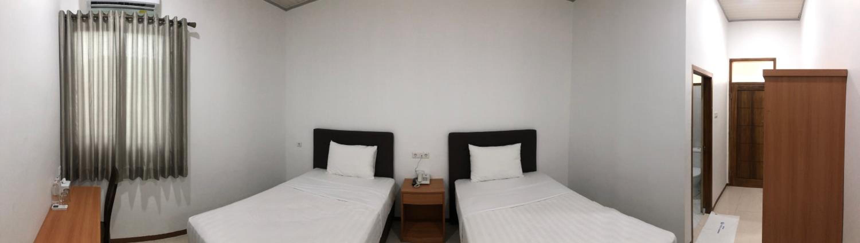 Economy Twin Room - Photo 1