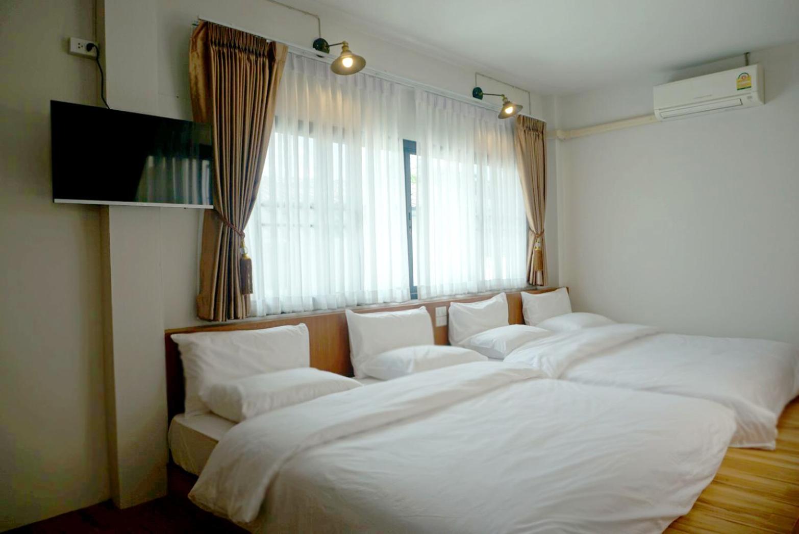 Deluxe Quadruple Room - Photo 4