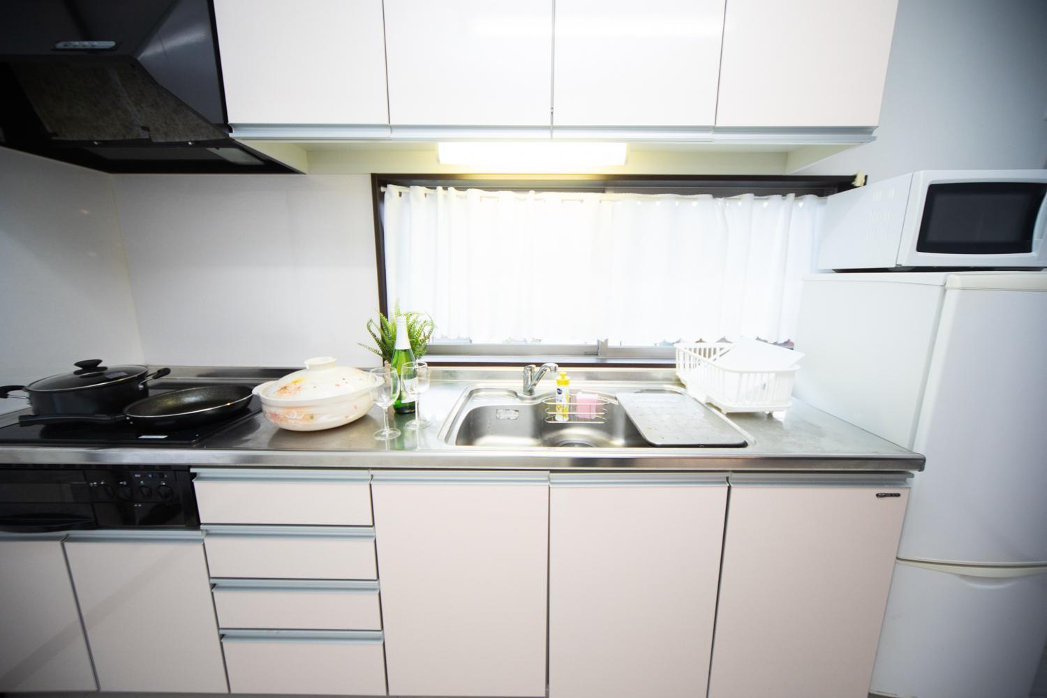 Three-Bedroom House - Photo 17
