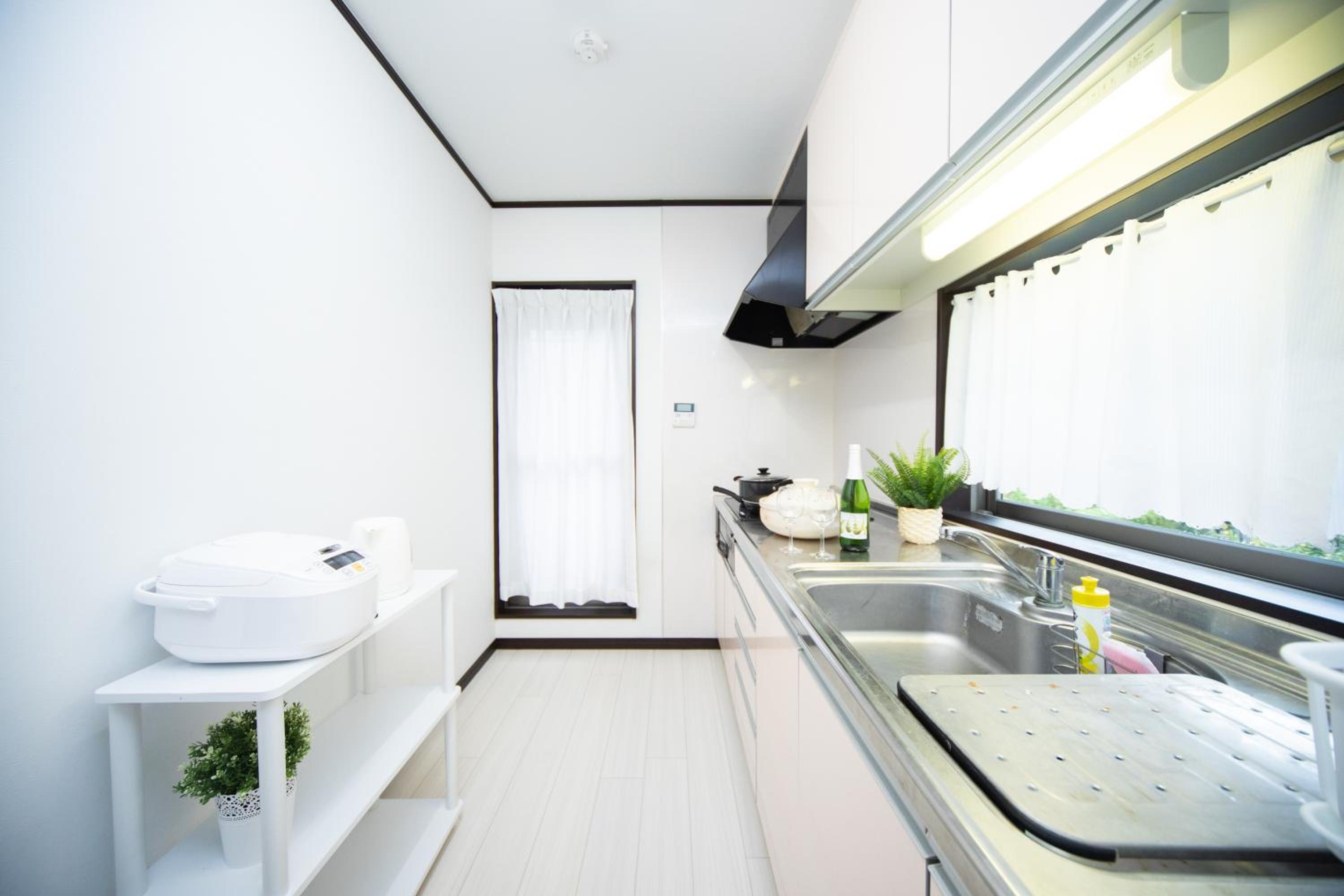 Three-Bedroom House - Photo 20
