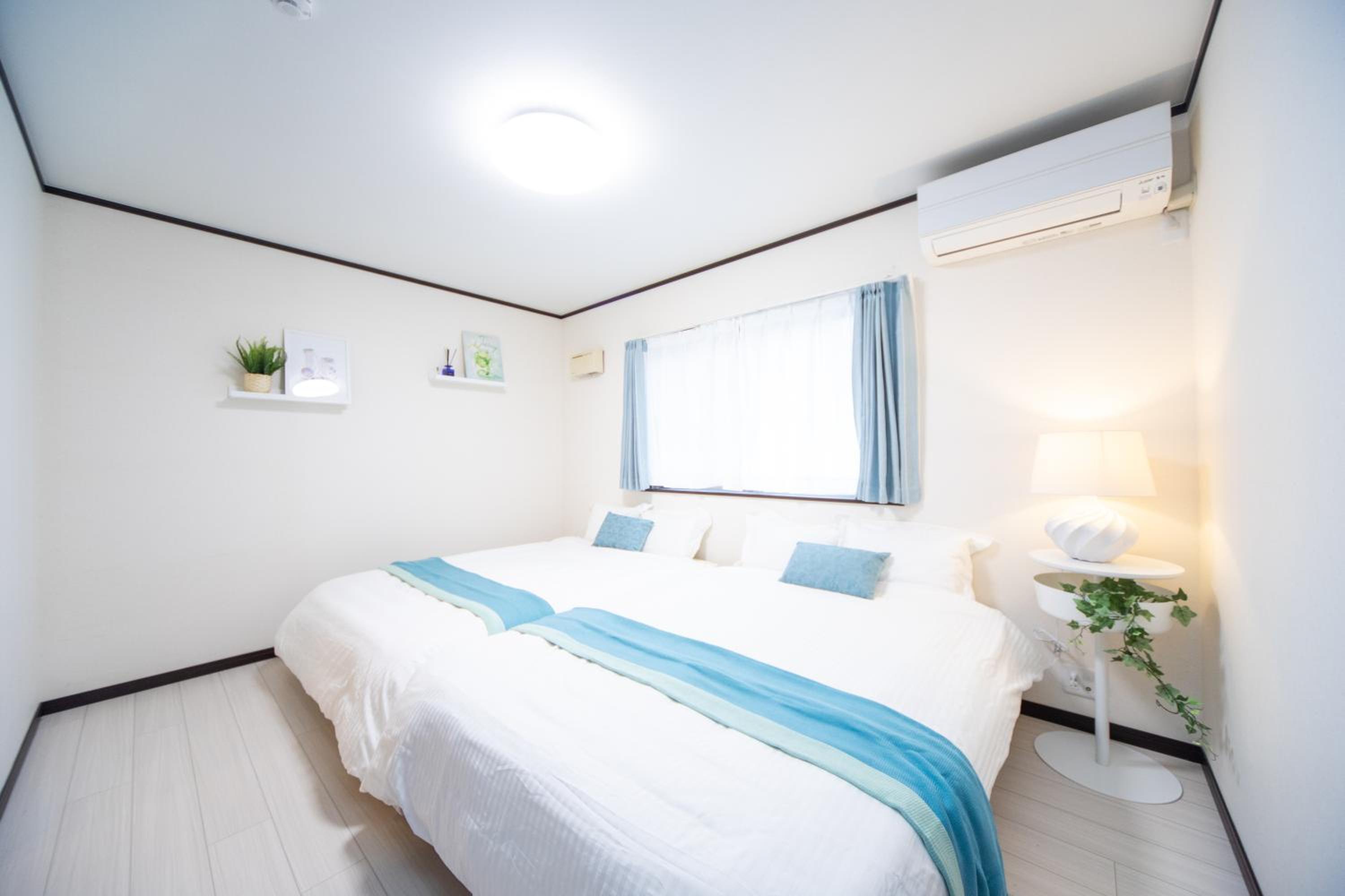 Three-Bedroom House - Photo 26